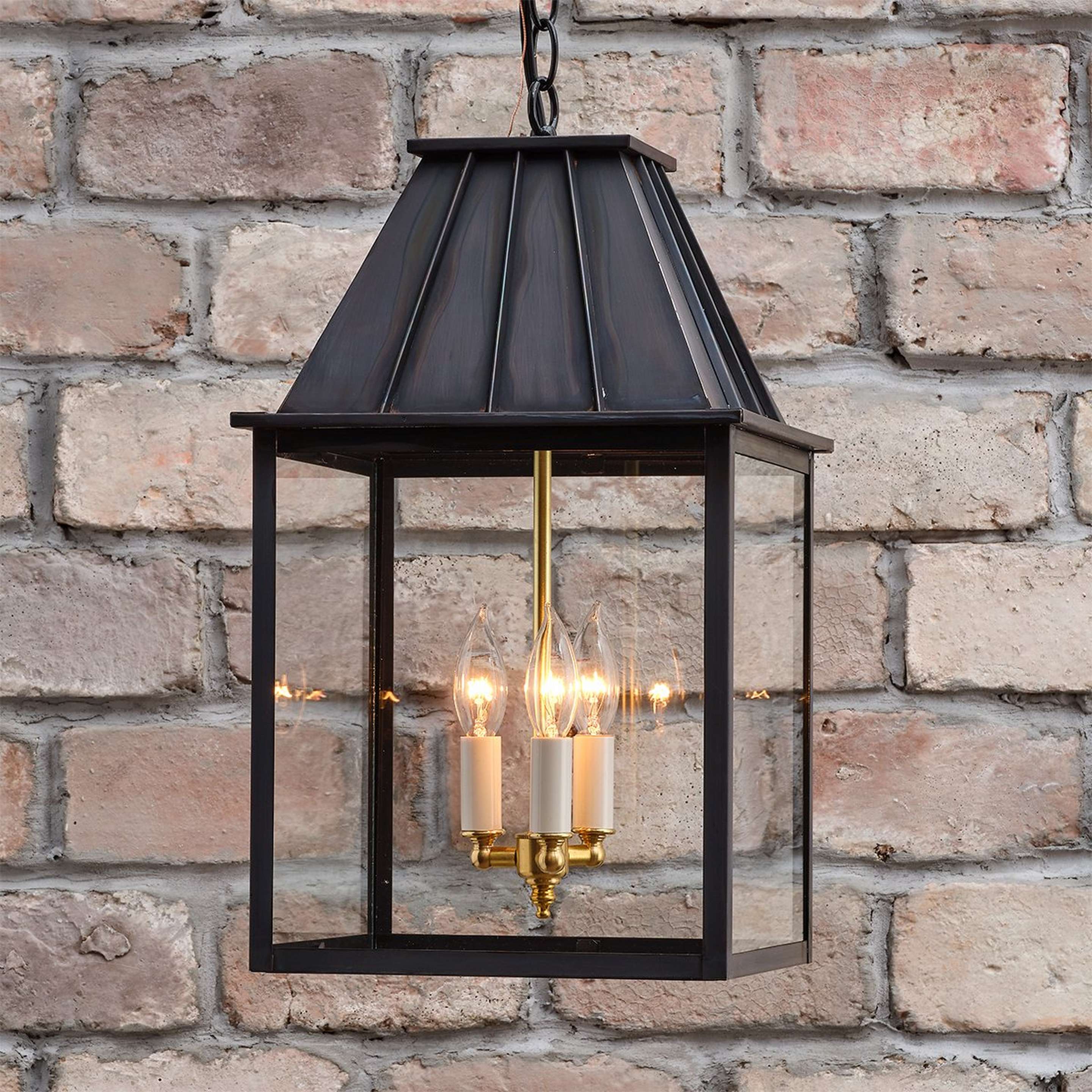 A Colonial Metalcrafts Mansard Outdoor Lantern with Darkened Copper / Clear Glass color