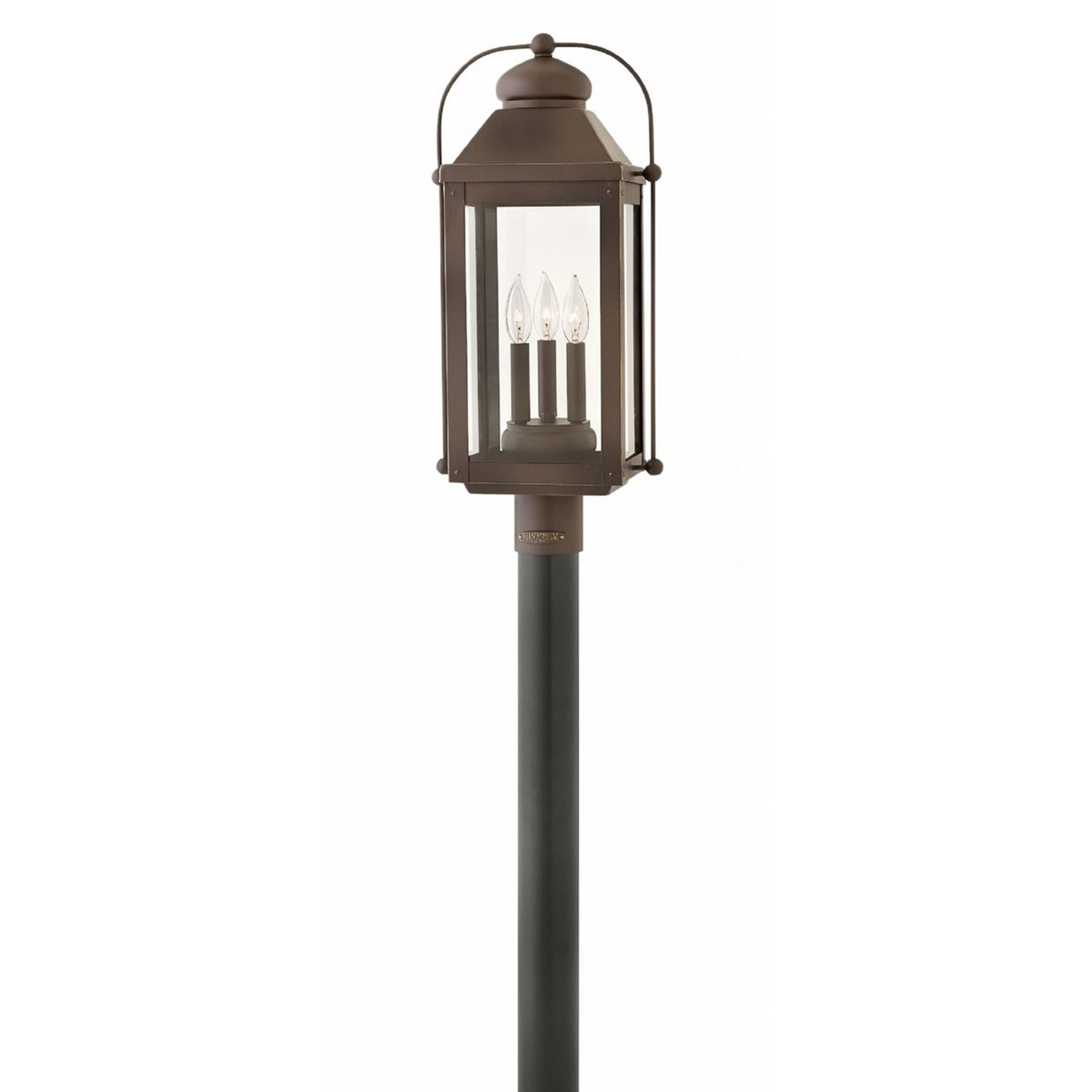 A Nostalgic Arched Carriage Outdoor Post Light with Light Oiled Bronze color