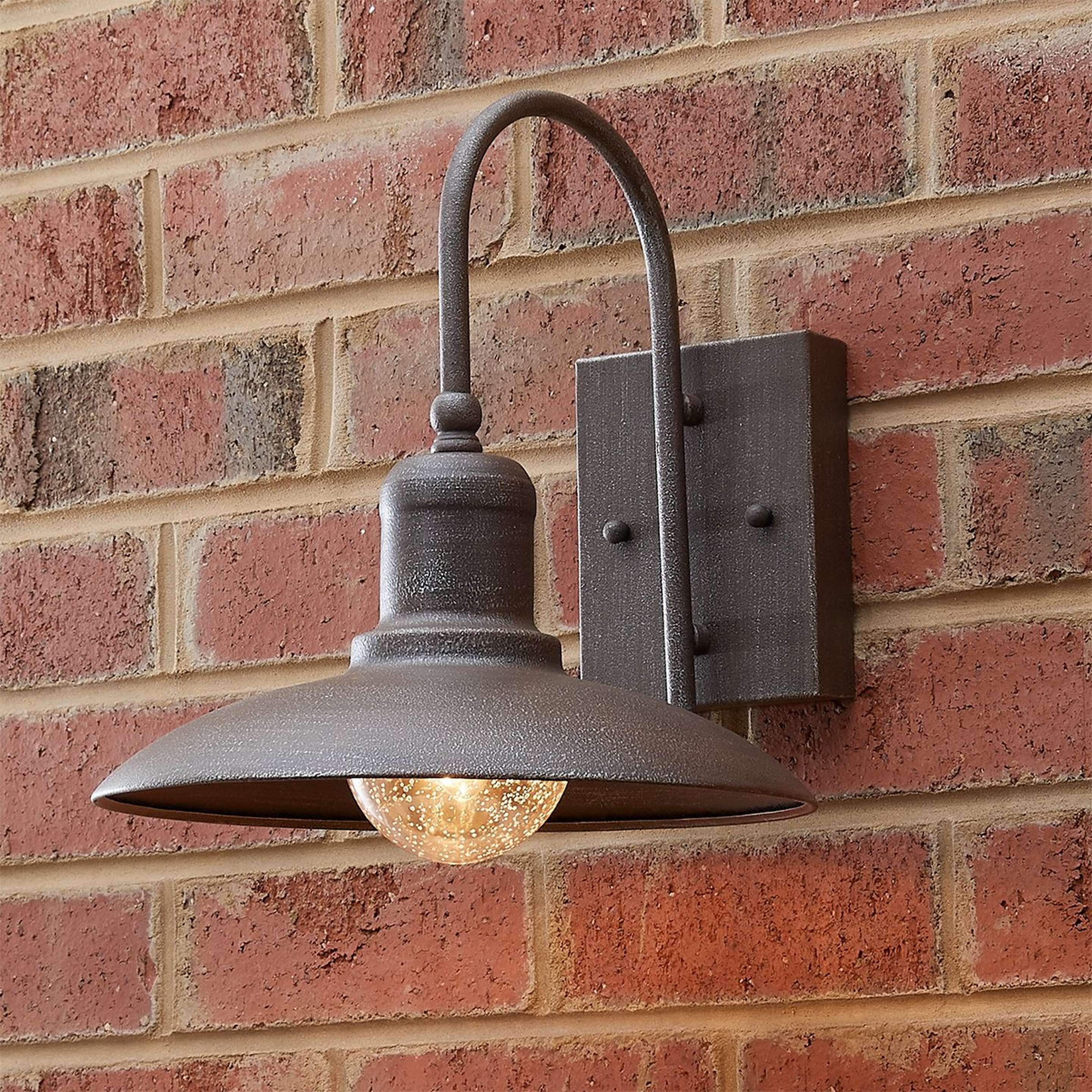 A Artisan Rustic Industrial Outdoor Sconce - Medium with Iron Rust color