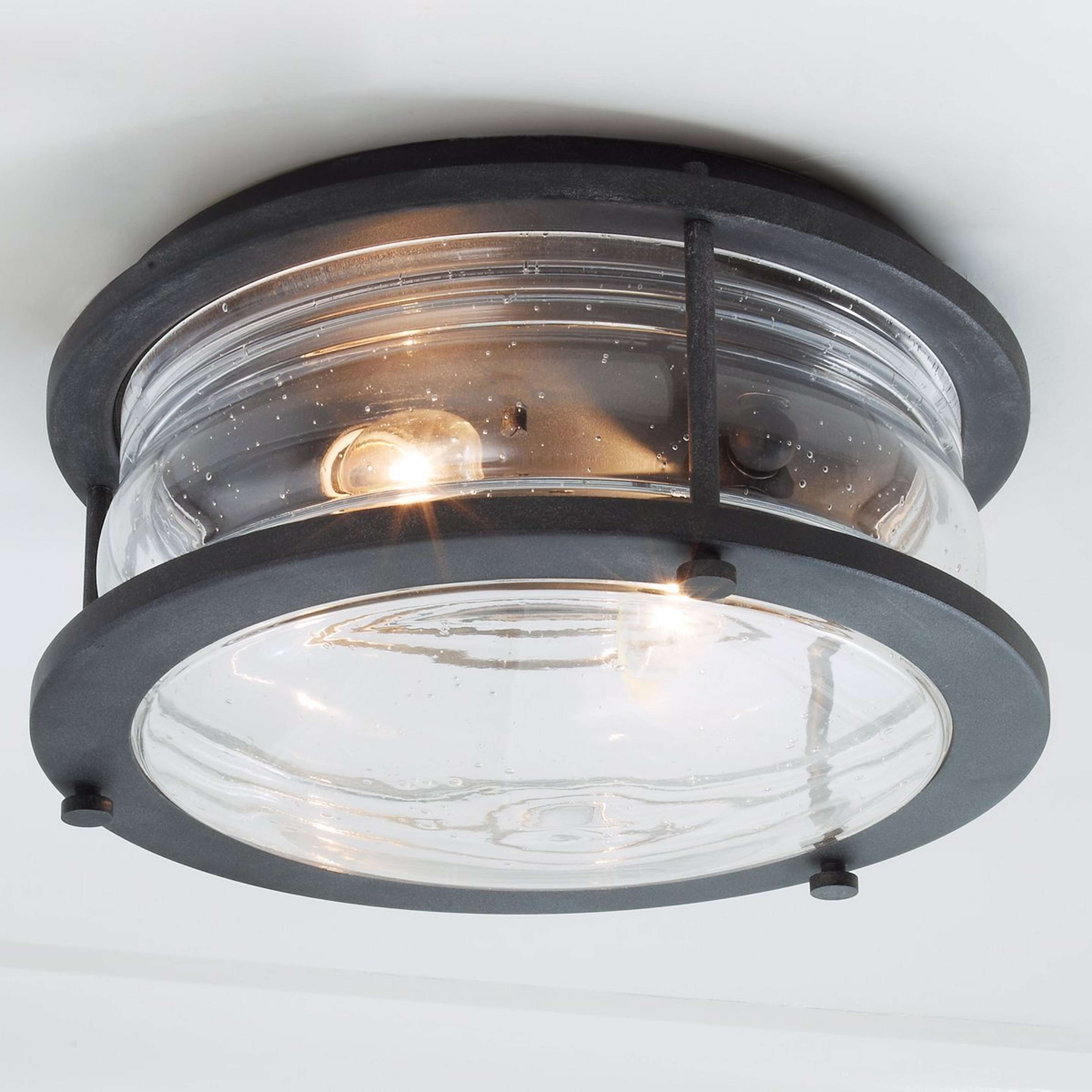 A Seeded Glass Jar Outdoor Ceiling Light with Weathered Zinc color