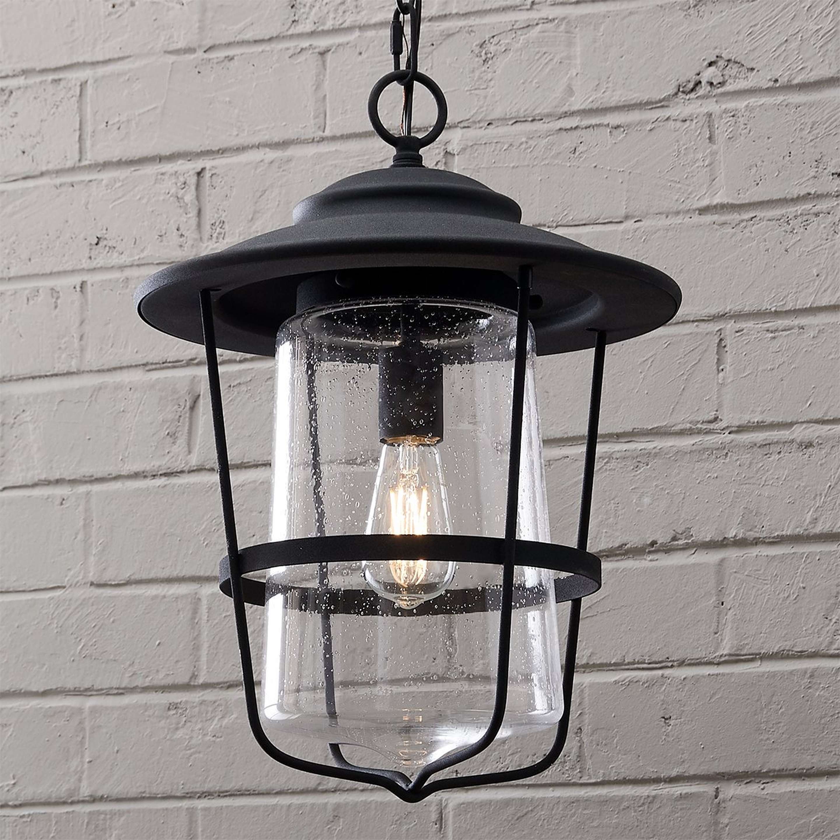A Contemporary Seeded Glass Outdoor Pendant with Black color