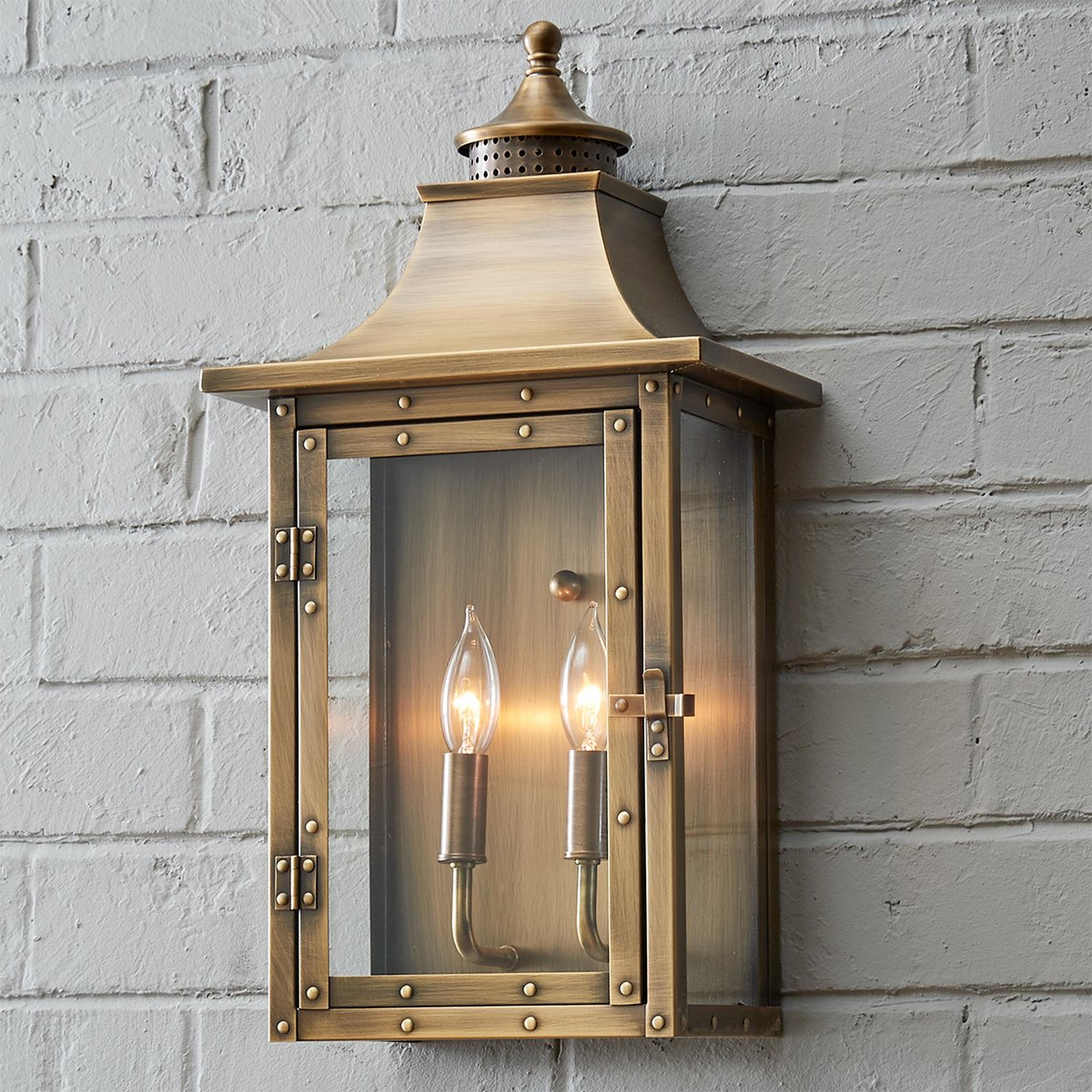 A Classic Vented Hood Outdoor Sconce - Large with Aged Brass color