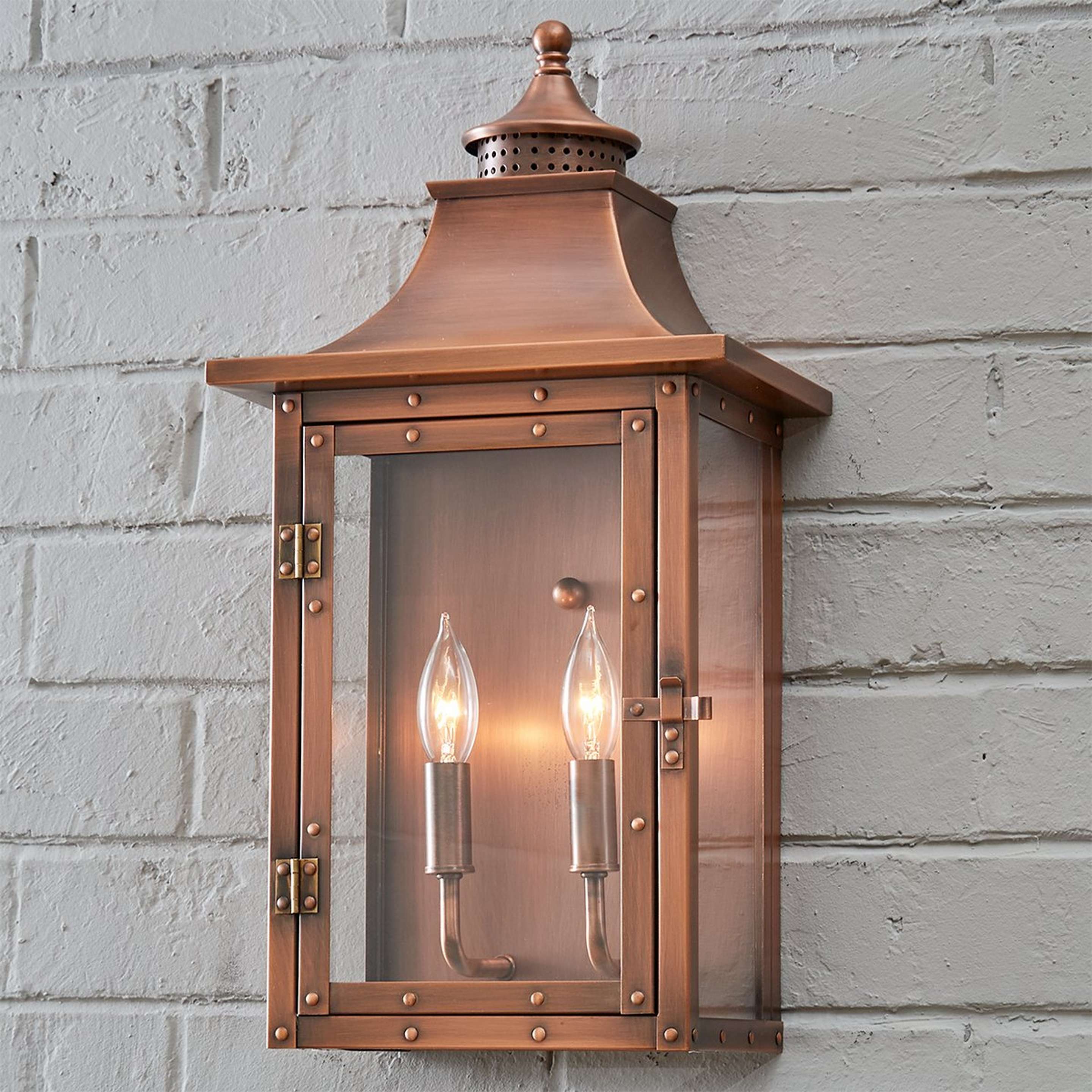 A Classic Vented Hood Outdoor Sconce - Large with Copper Patina color
