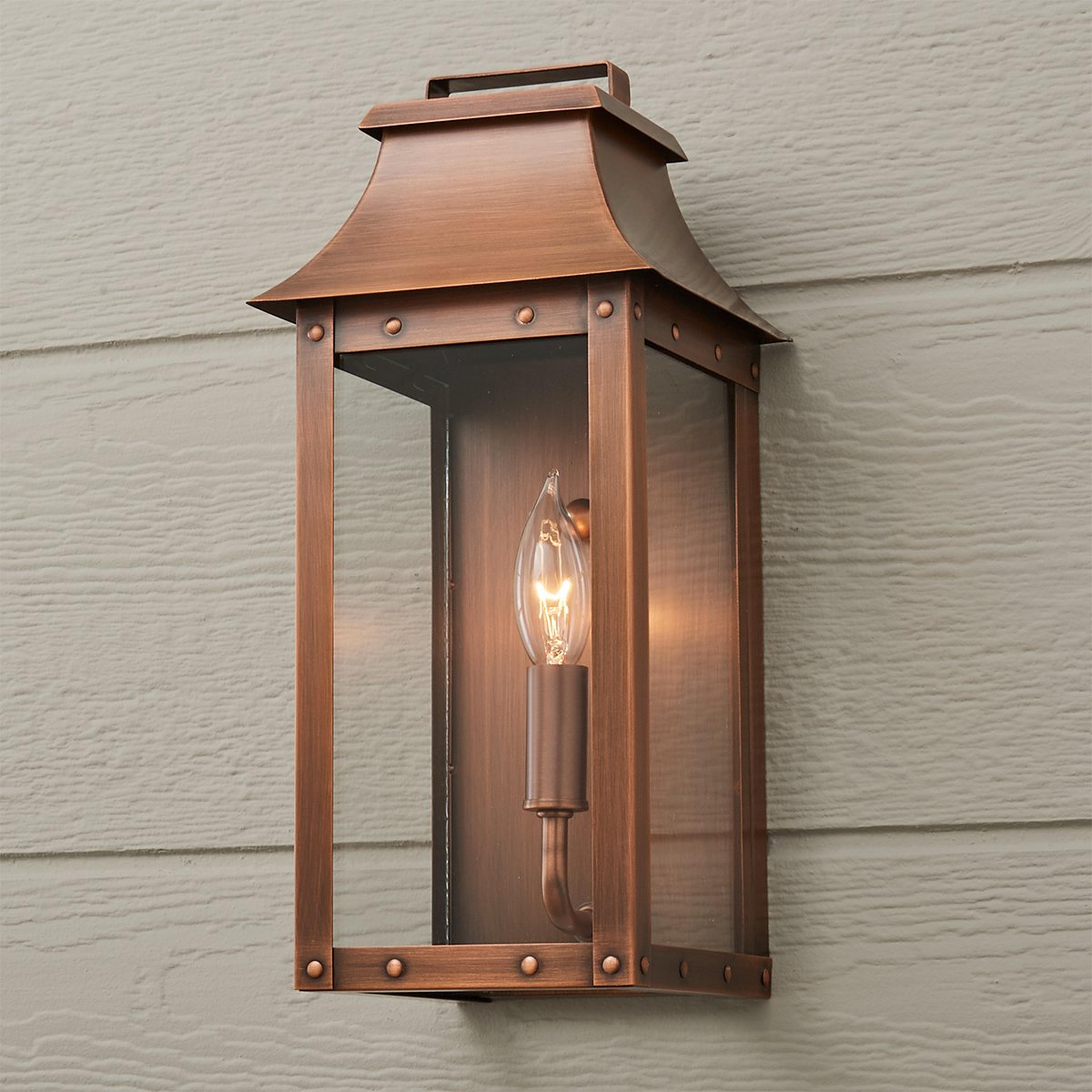 A Traditional Studded Framed Box Outdoor Sconce - Small with Copper Patina color