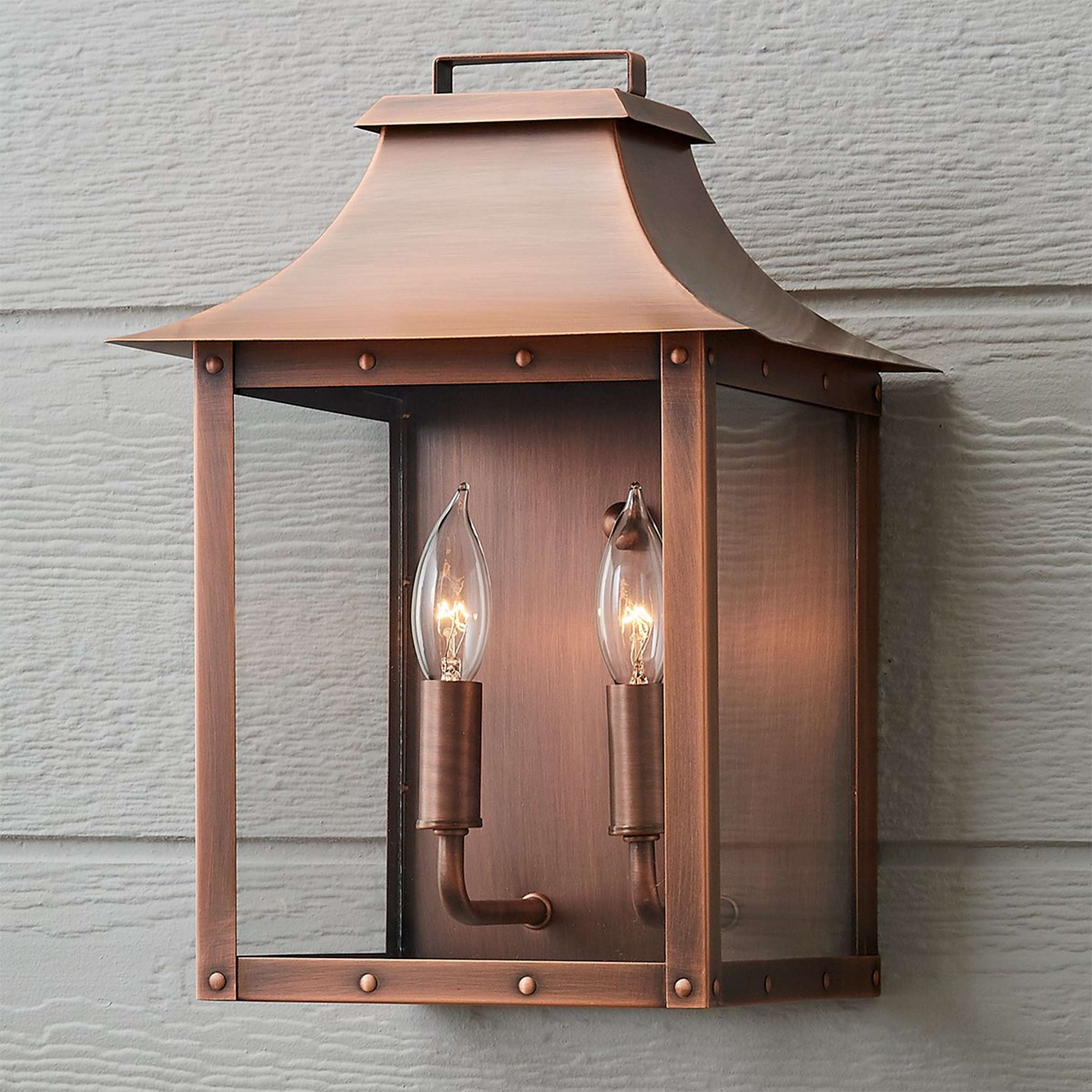 A Traditional Studded Framed Box Outdoor Sconce - Large with Copper Patina color