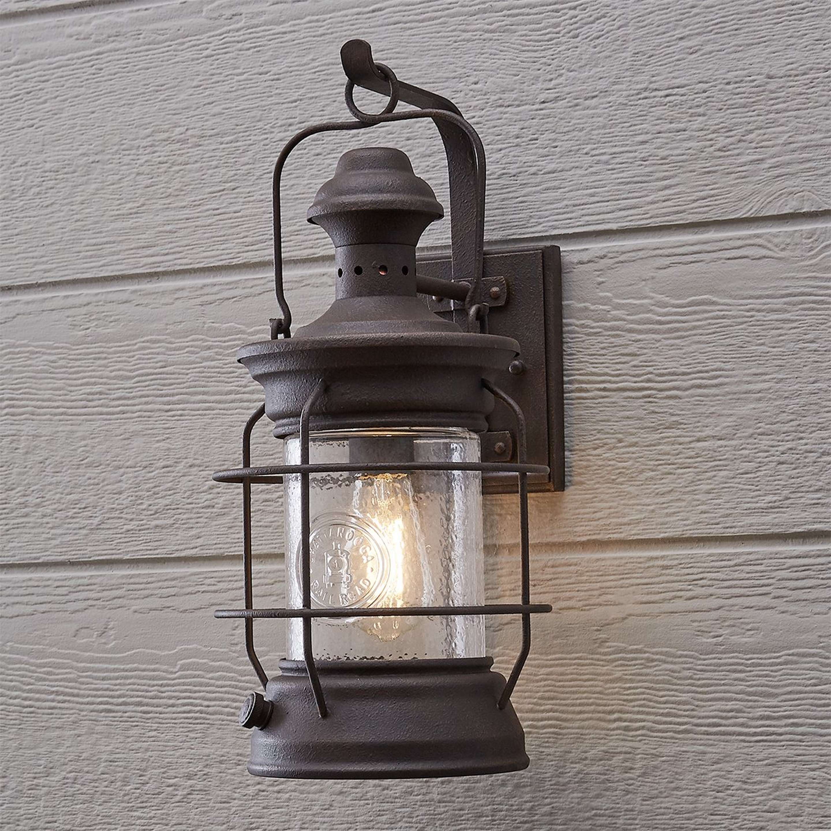 A Historic Rusted Lantern Outdoor Sconce - Medium with Centennial Rust color