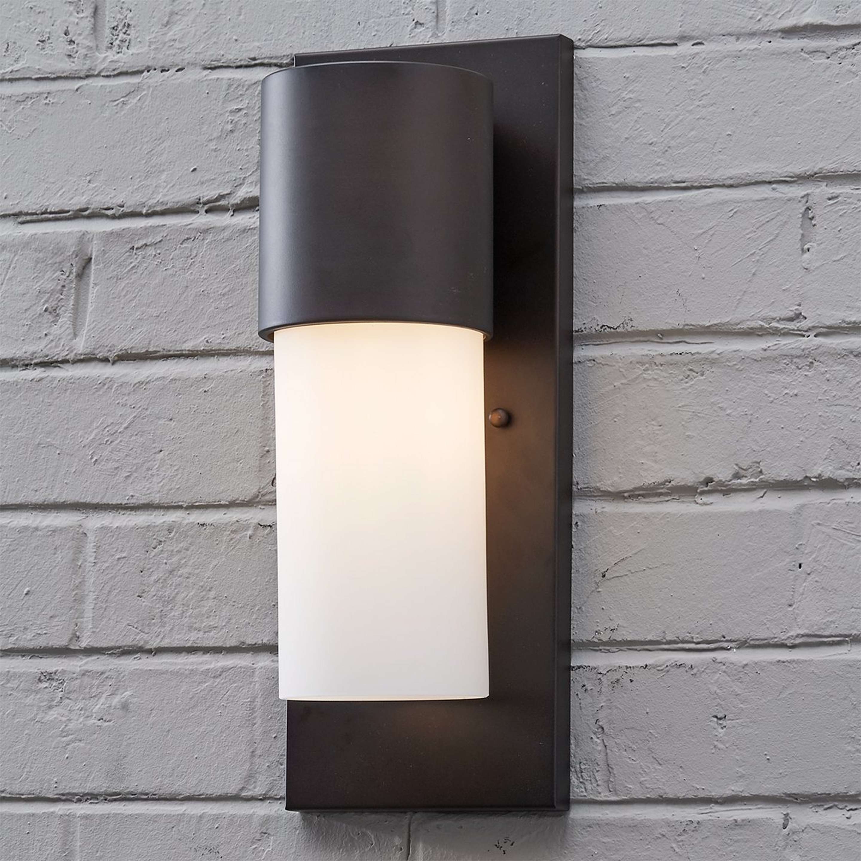 A Wright Cylinder Outdoor Sconce with Bronze color
