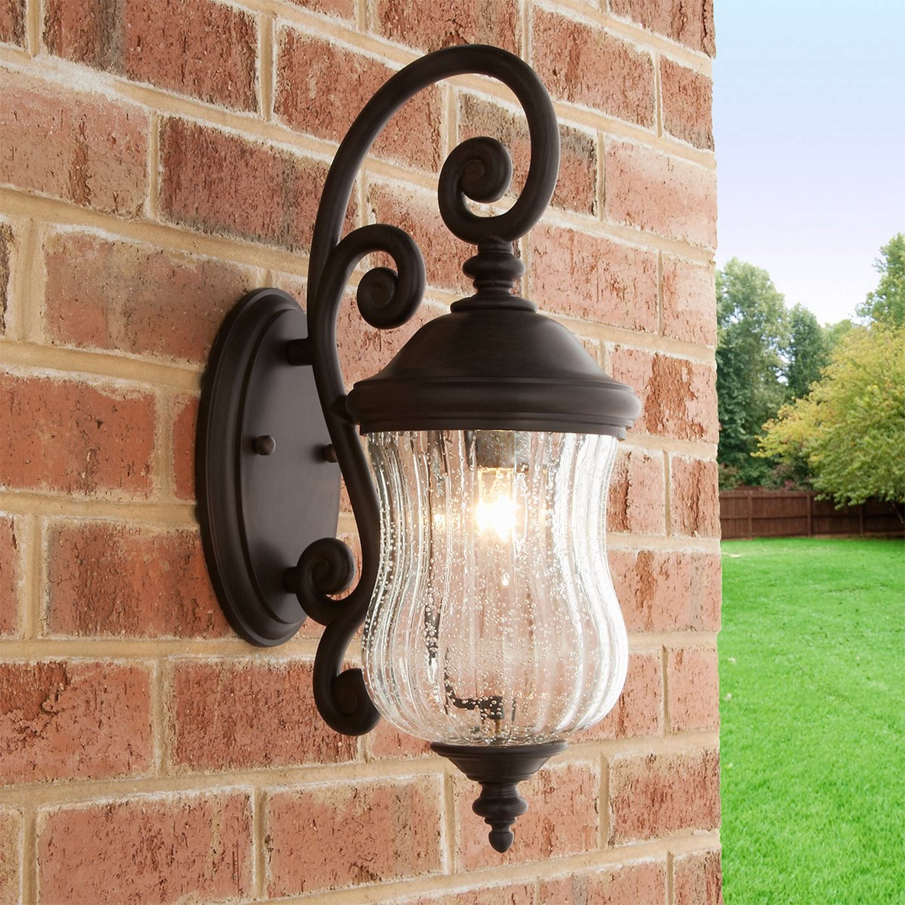 A Nassau Extreme Outdoor Sconce - 1 Light with Brushed Black / Seedy Glass color