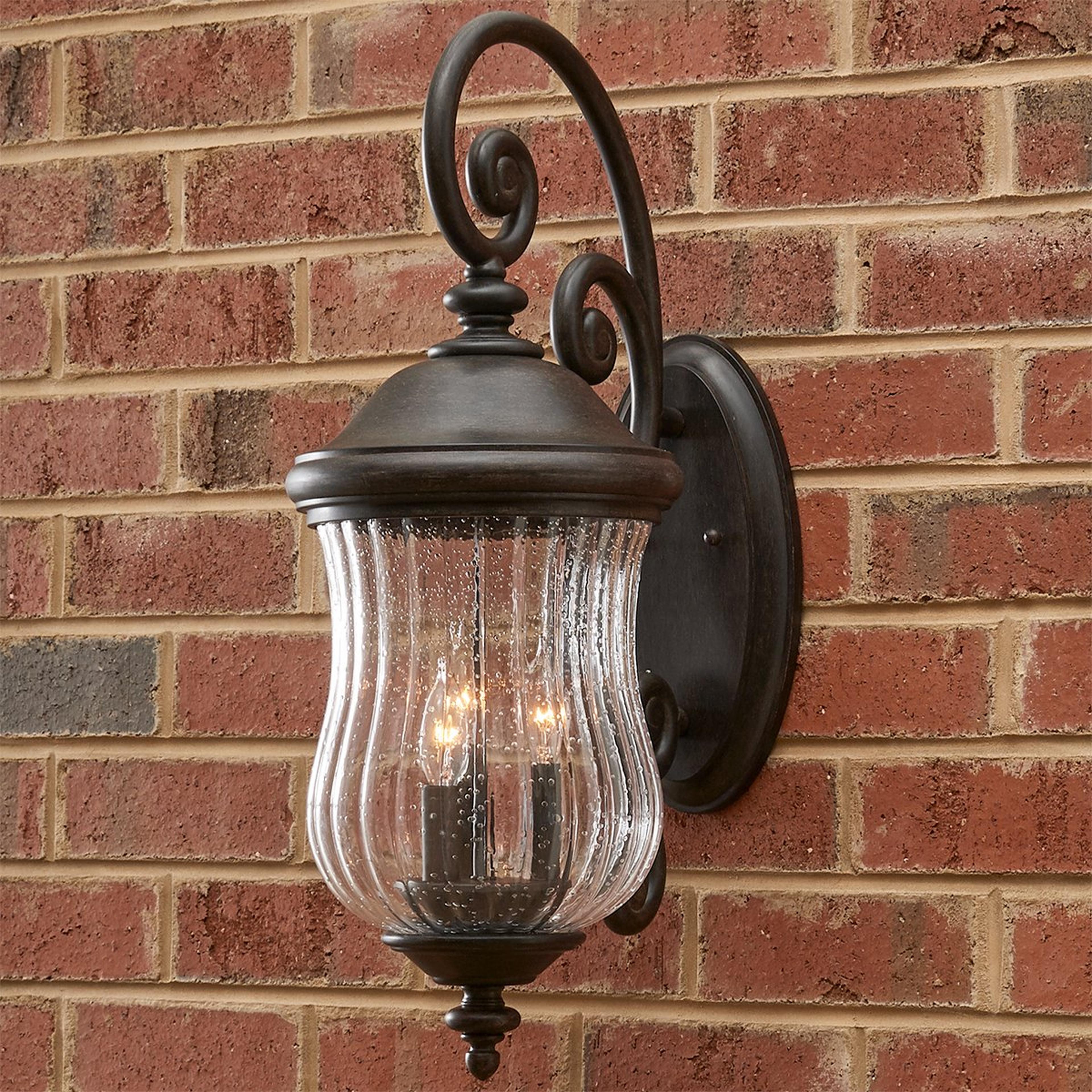 A Nassau Extreme Outdoor Sconce - 3 Light with Brushed Black / Seedy Glass color