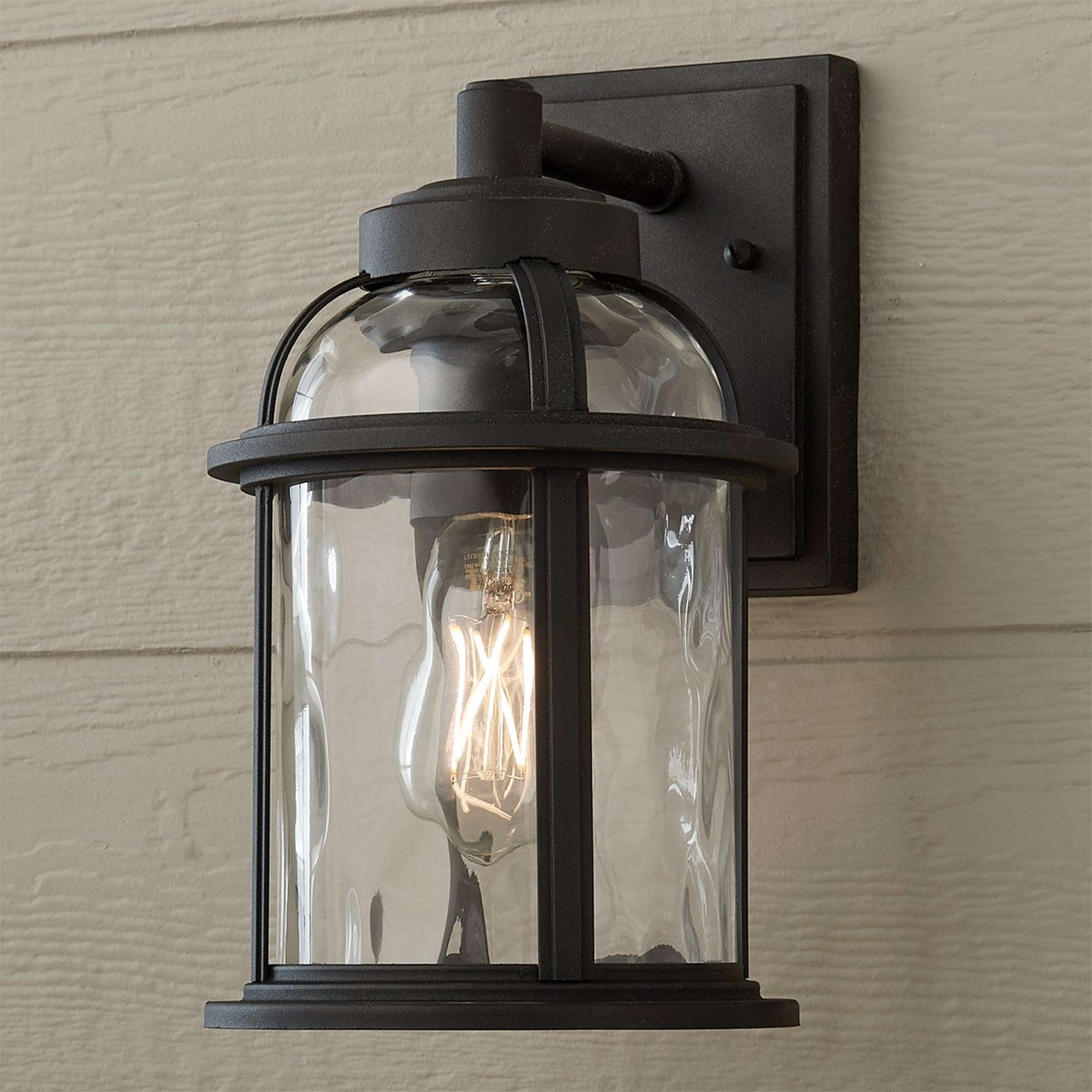 A Undulated Outdoor Sconce - 1 Light with Black / Clear Glass color