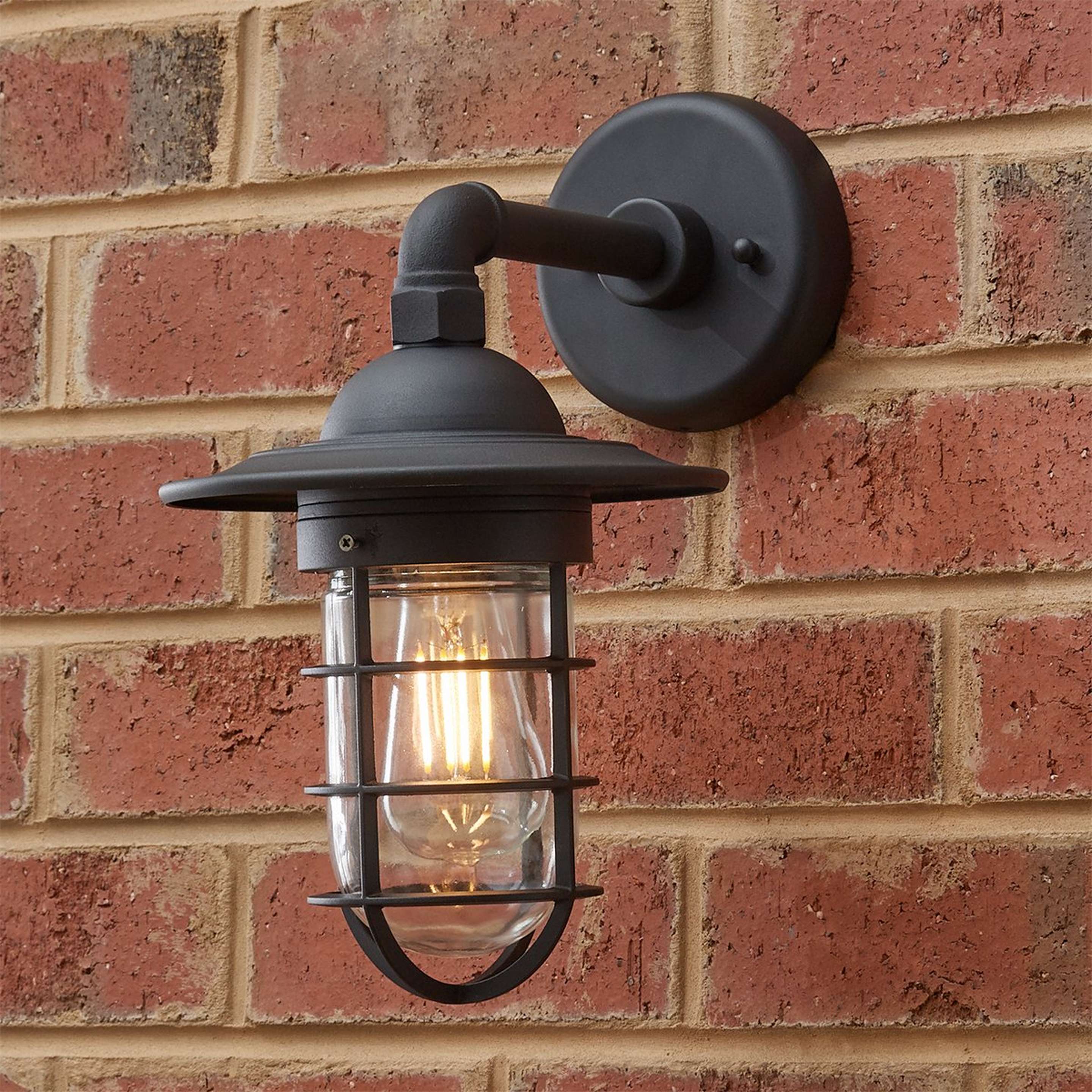 A Blissful Boathouse Outdoor Sconce with Black / Clear color