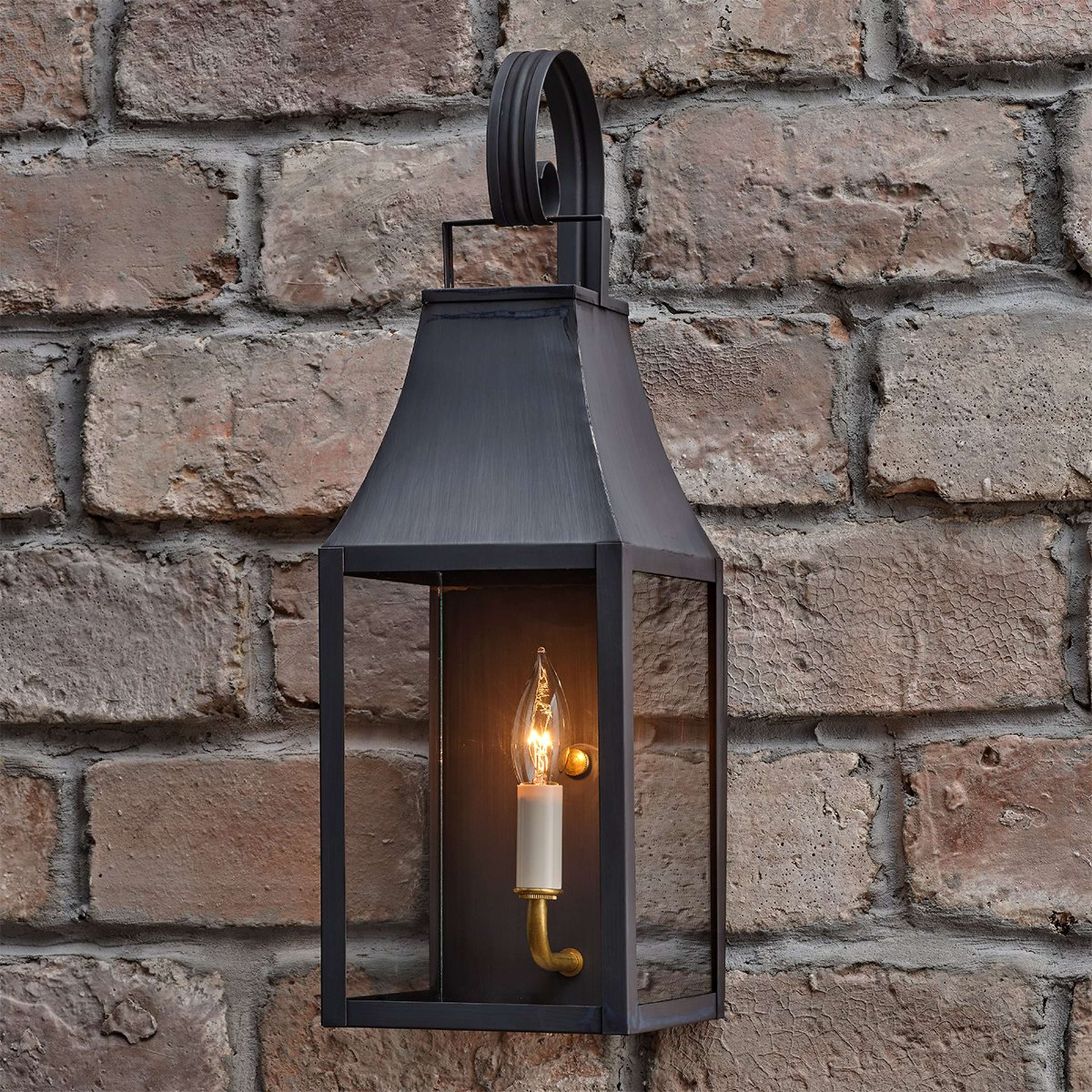 A Colonial Metalcrafts Capital Outdoor Sconce - Small with Darkened Copper / Clear Glass color