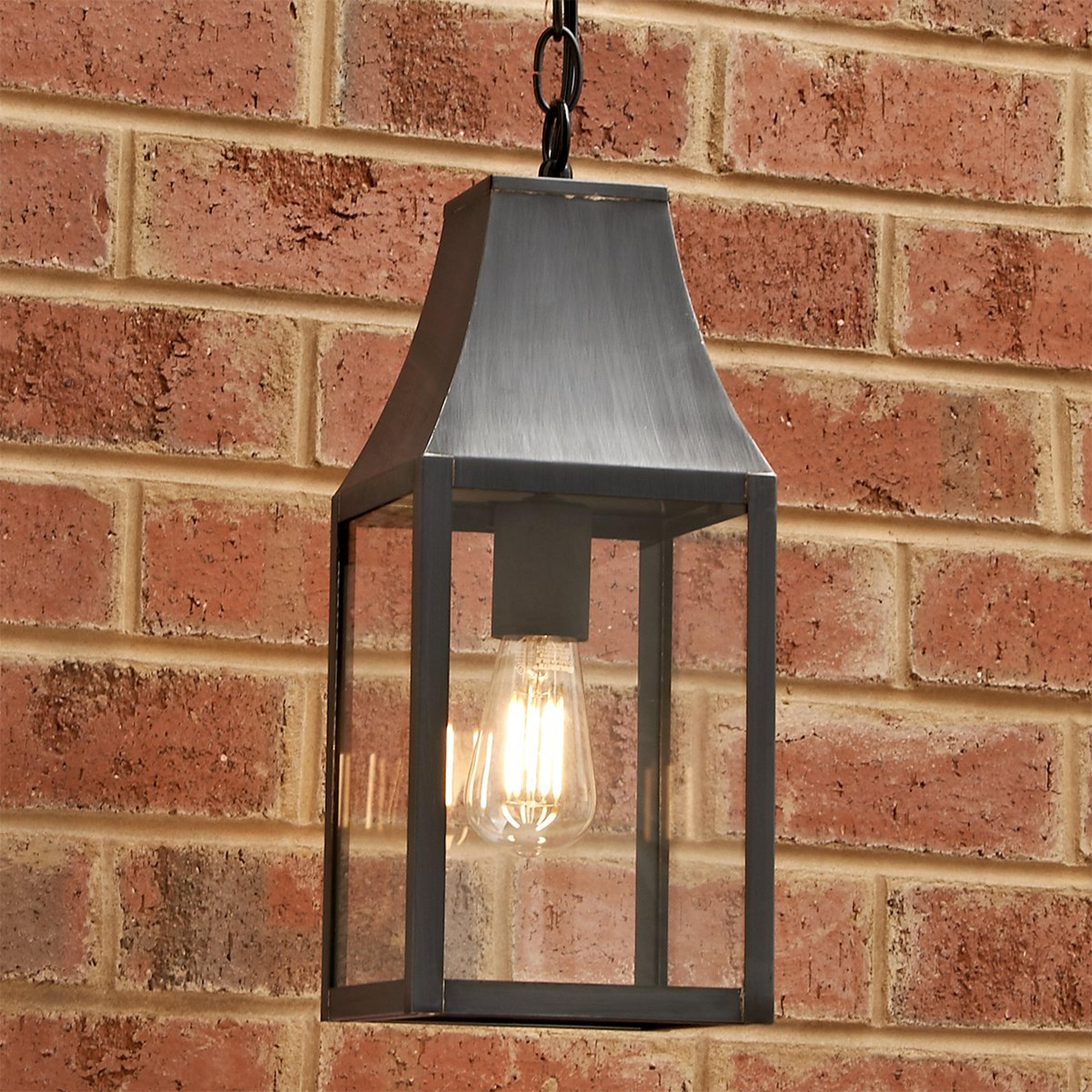 A Colonial Metalcrafts Capital Outdoor Lantern - Small with Darkened Copper / Clear Glass color