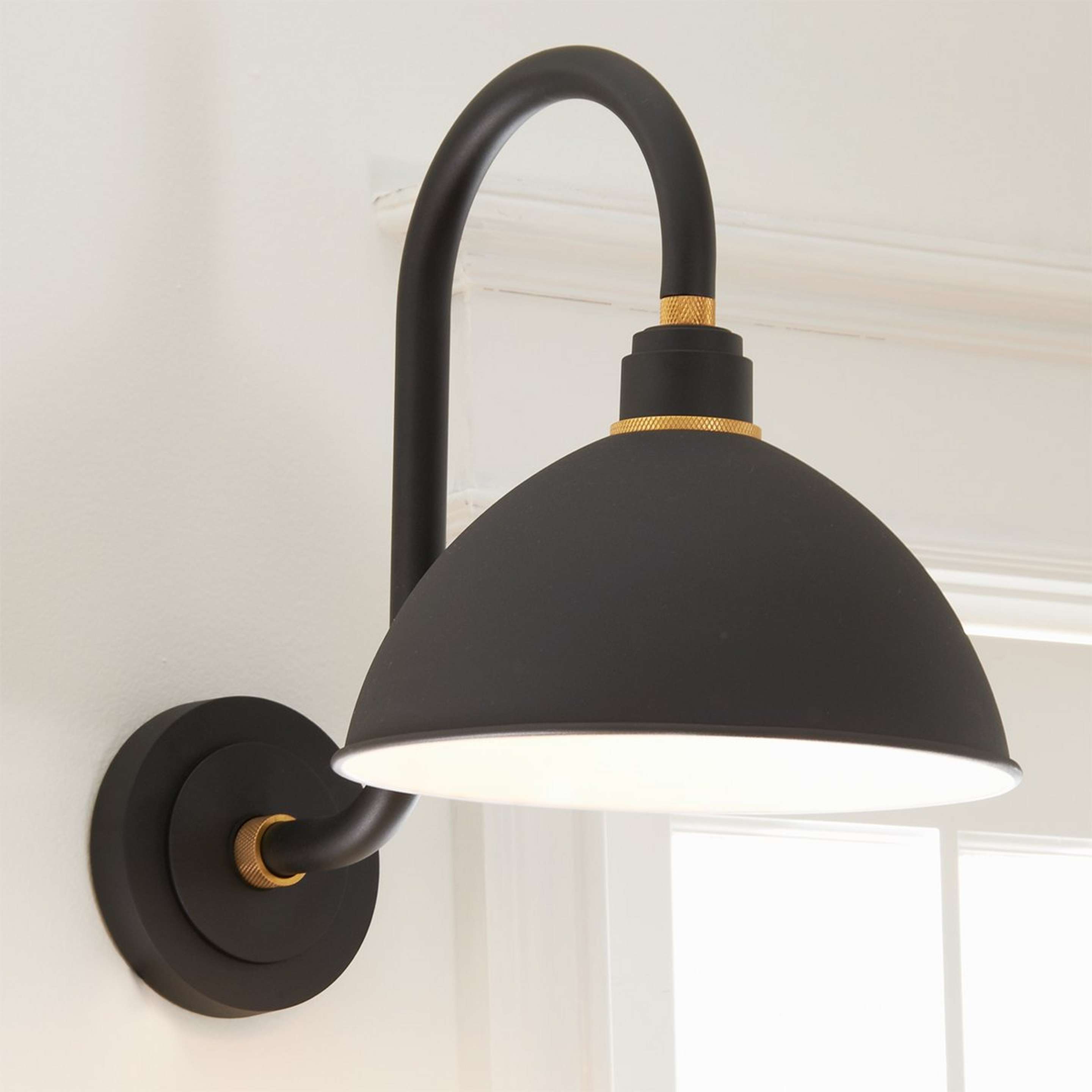 A Knurled Accent Outdoor Sconce with Black / Brass color