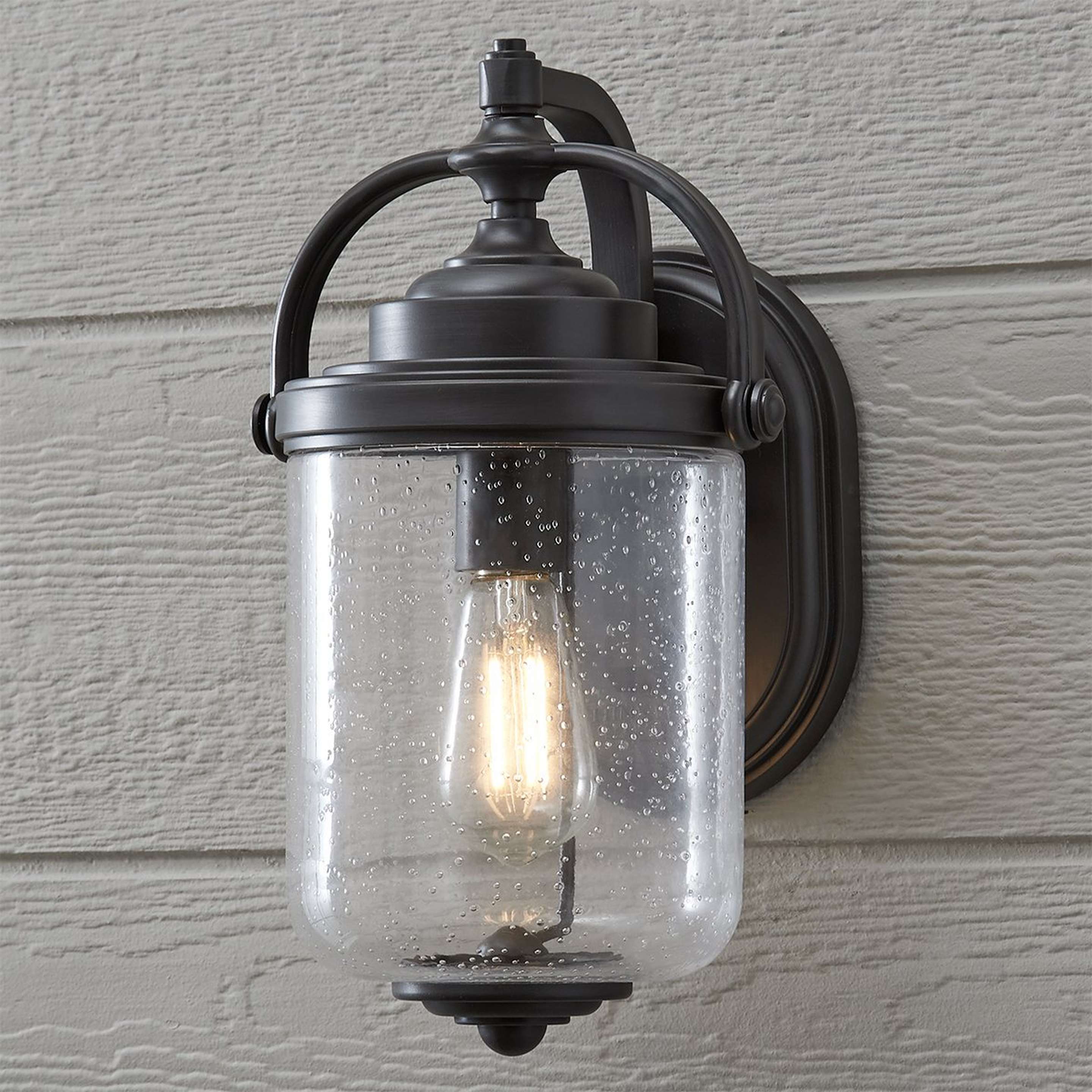 A Jacksonville Outdoor Sconce - Small with Oil Rubbed Bronze / Seedy Glass color