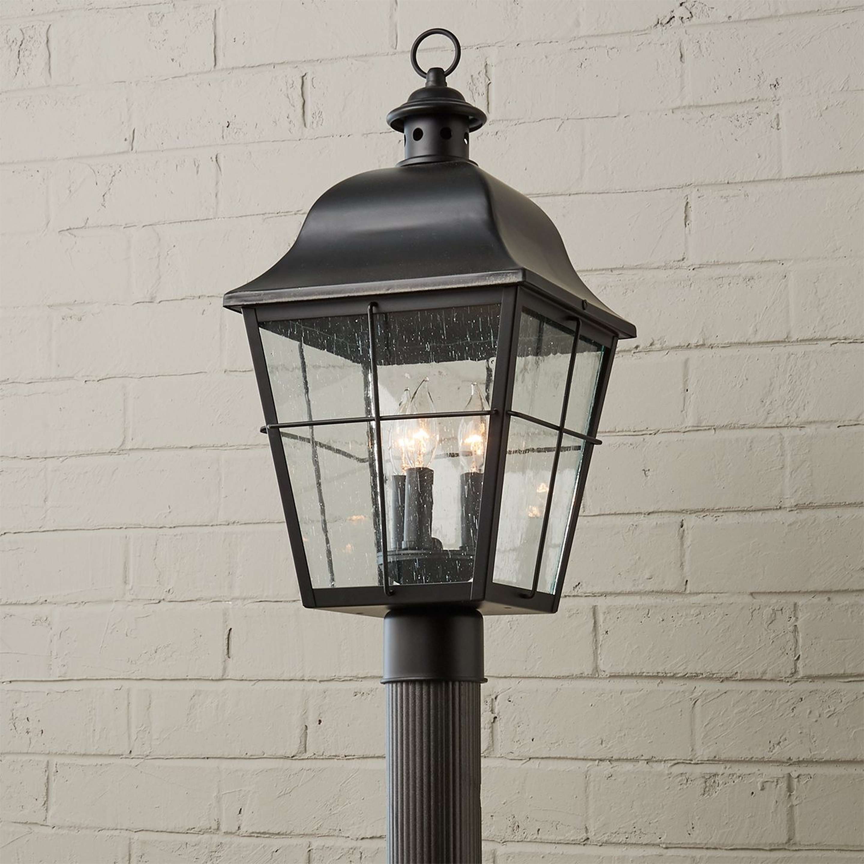 A Millhouse Outdoor Post Light with Black / Seedy Glass color