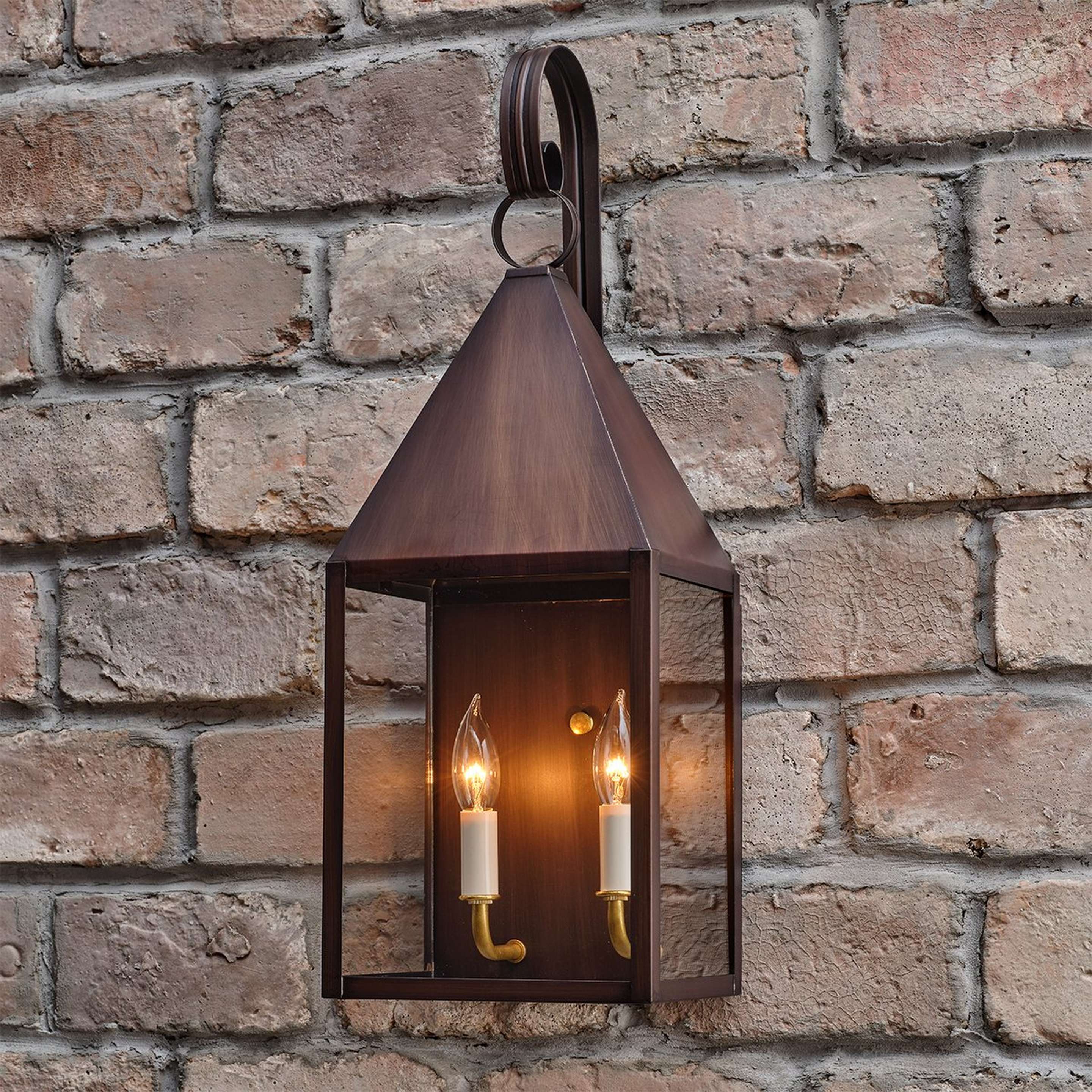 A Colonial Metalcrafts Cape Outdoor Sconce - Large with Darkened Copper / Clear Glass color