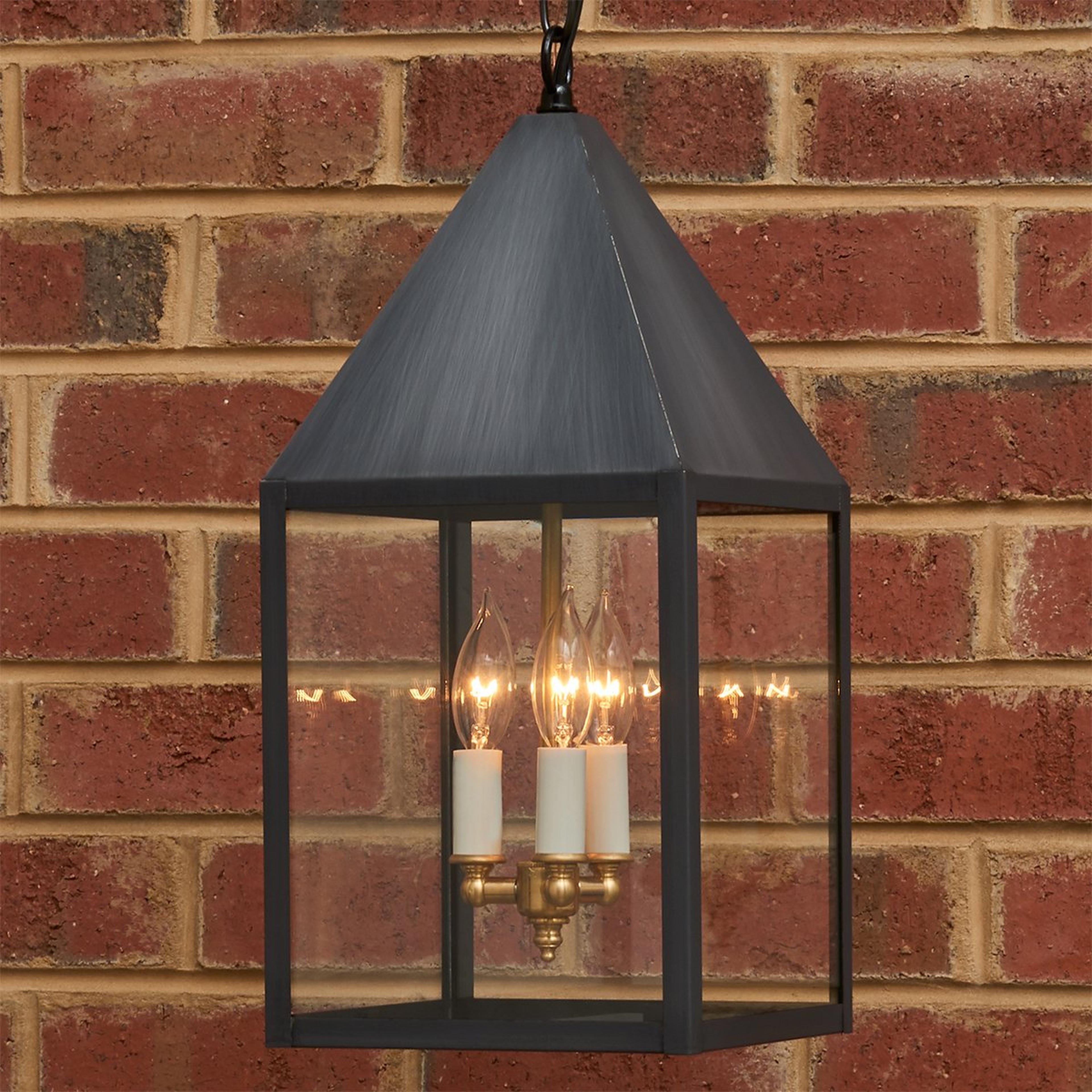 A Colonial Metalcrafts Cape Outdoor Lantern with Darkened Copper / Clear Glass  color