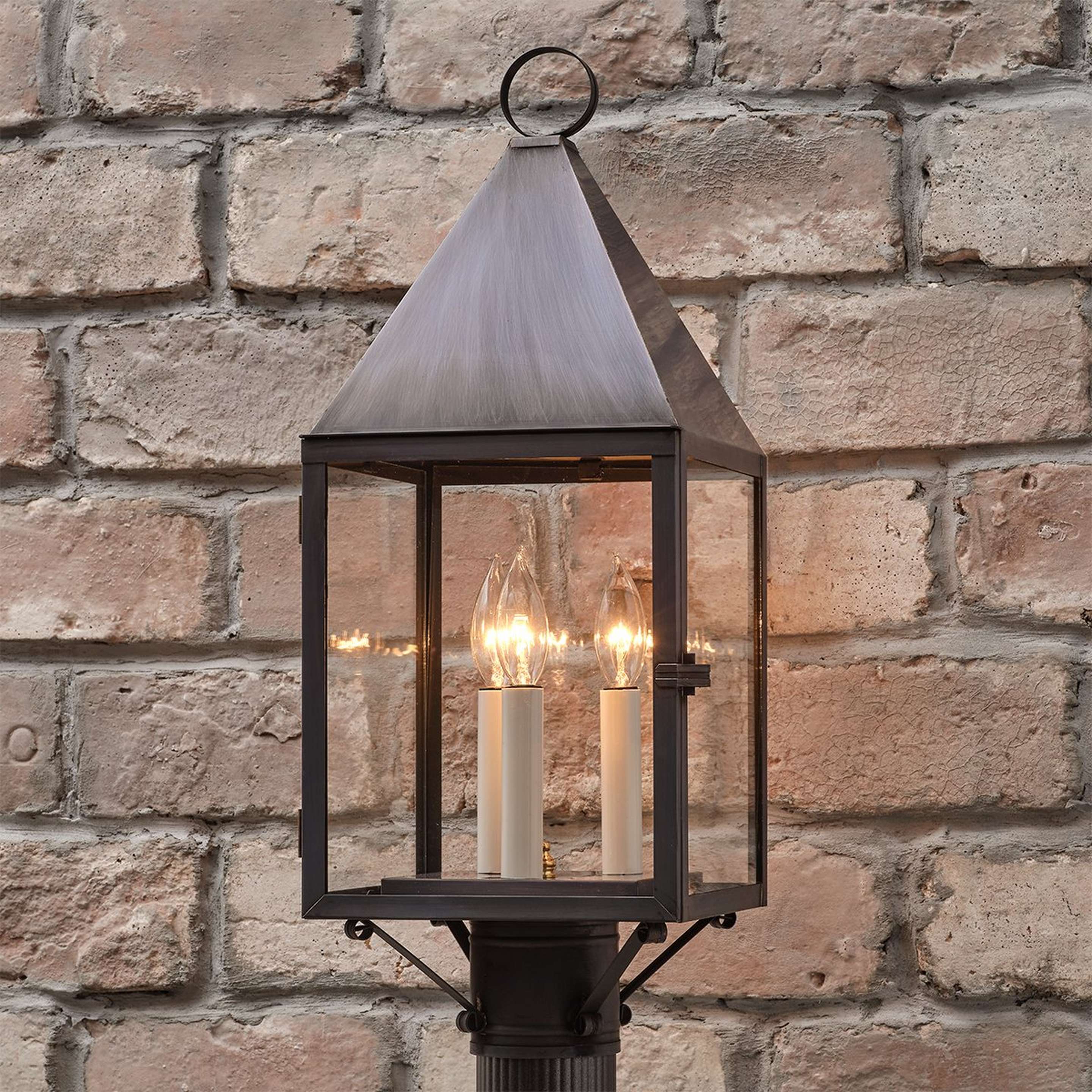 A Colonial Metalcrafts Cape Outdoor Post Light with Darkened Copper / Clear Glass color
