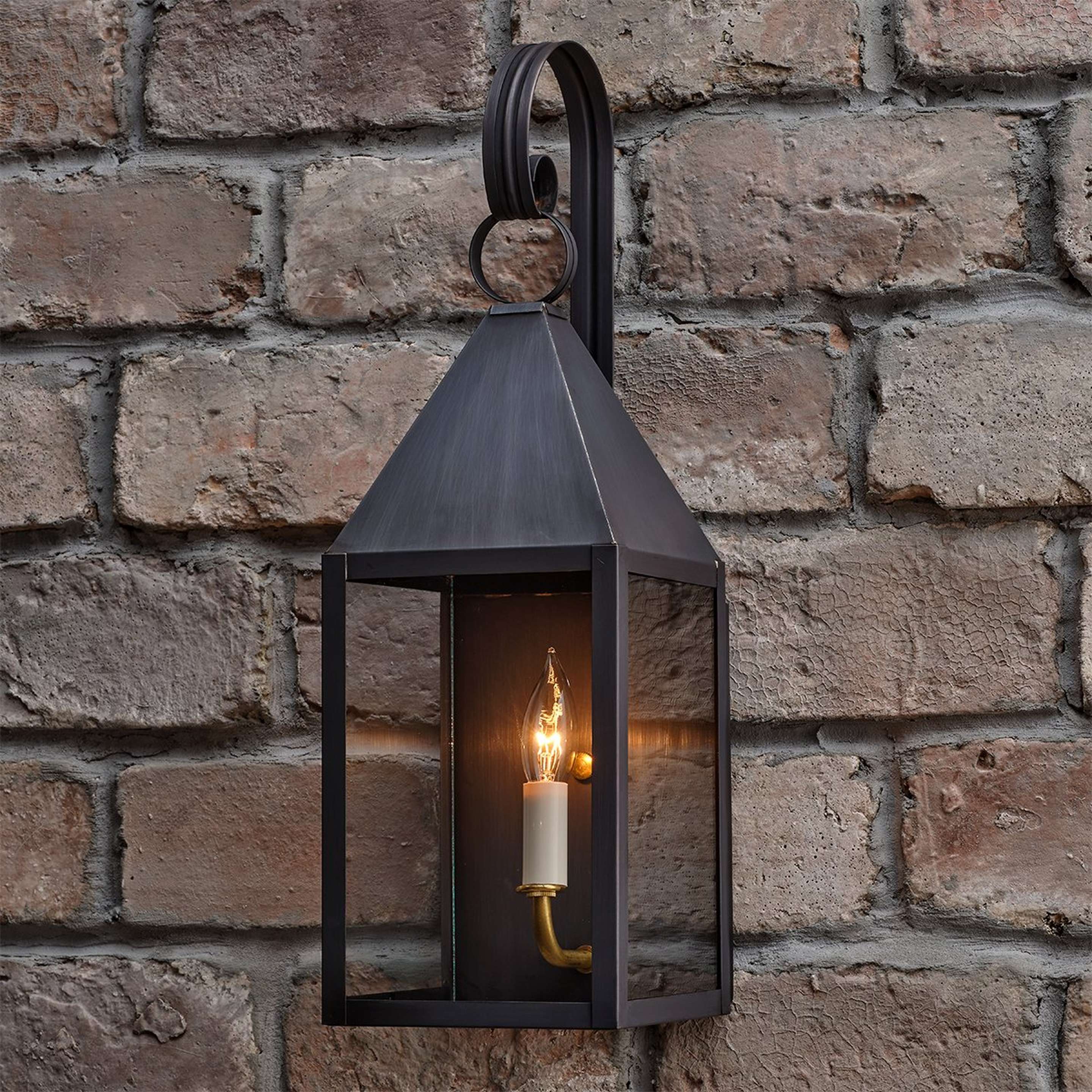 A Colonial Metalcrafts Cape Outdoor Sconce  - Small with Darkened Copper / Clear Glass color