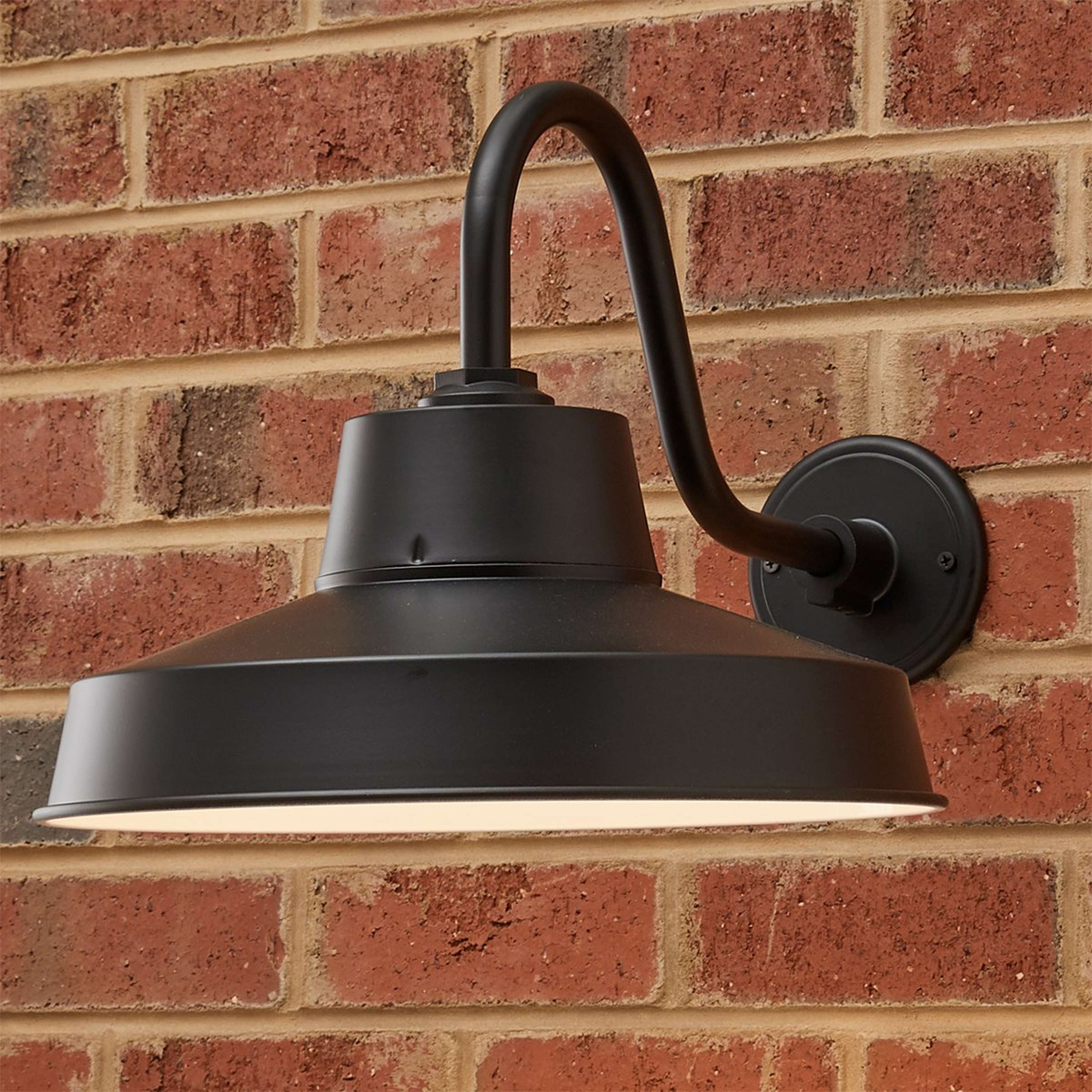 A Polished Industrial Outdoor Sconce with Black color