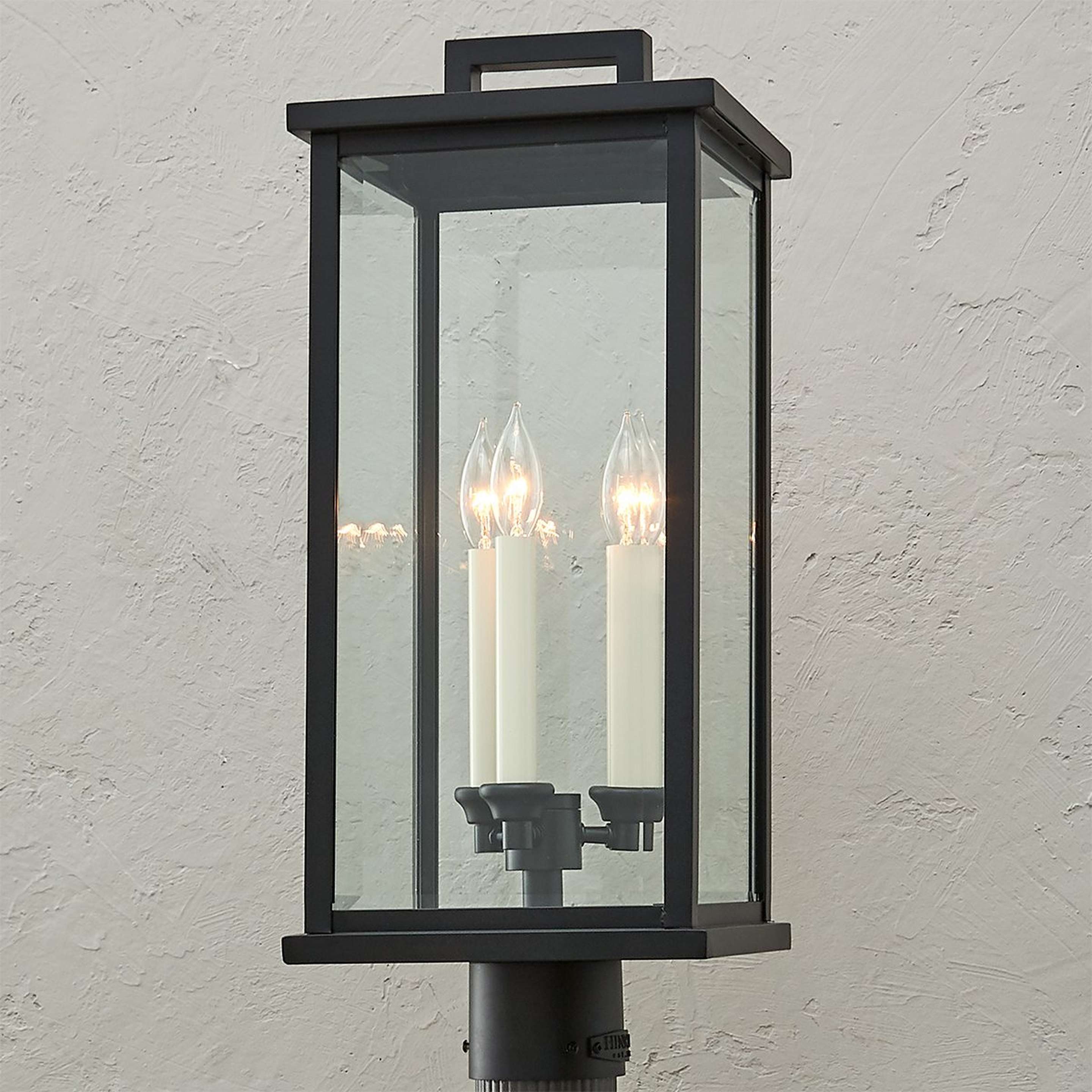 A Carrington Outdoor Post Light with Black / Clear Beveled Glass color