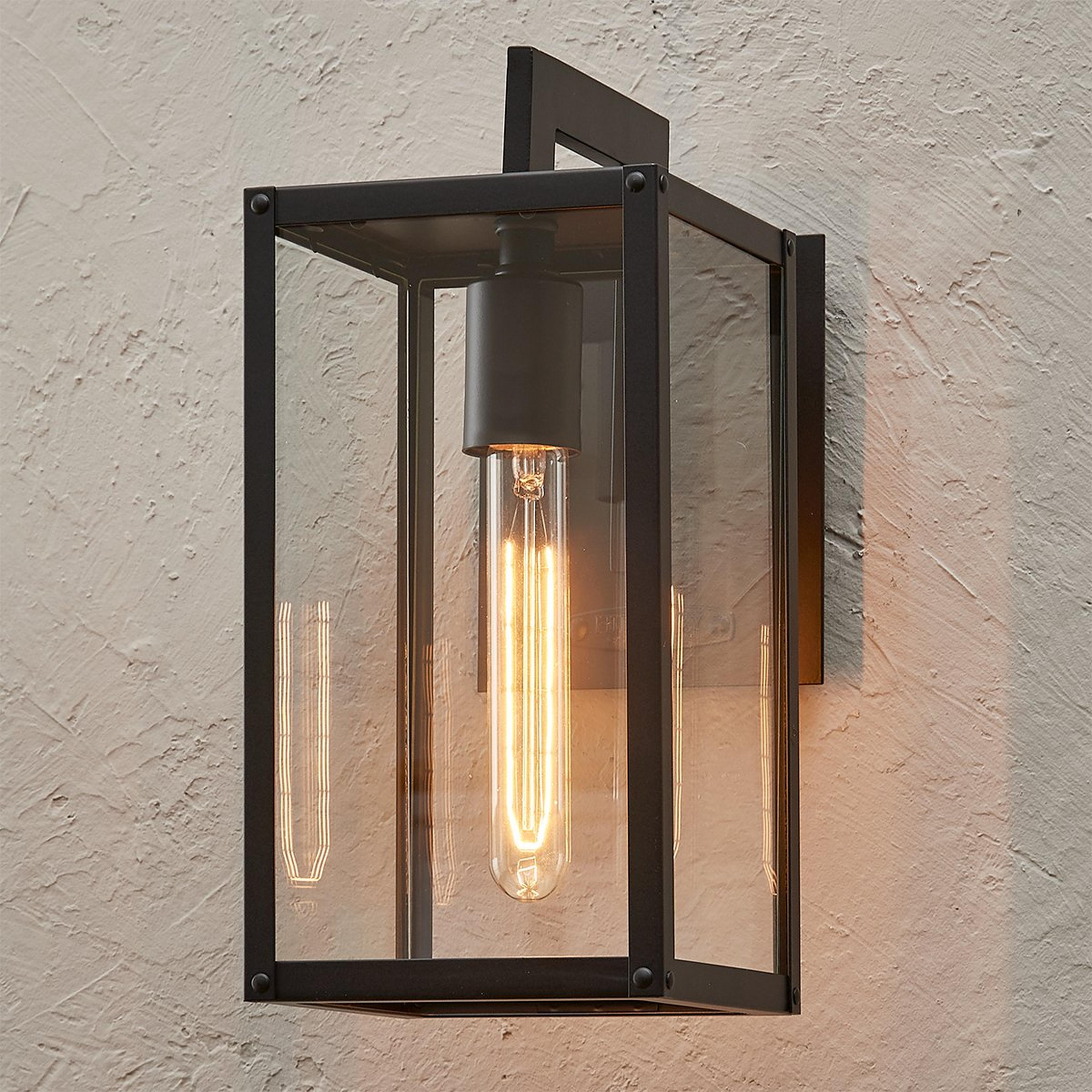 A Creswell Outdoor Sconce - Small with Black / Clear Glass color
