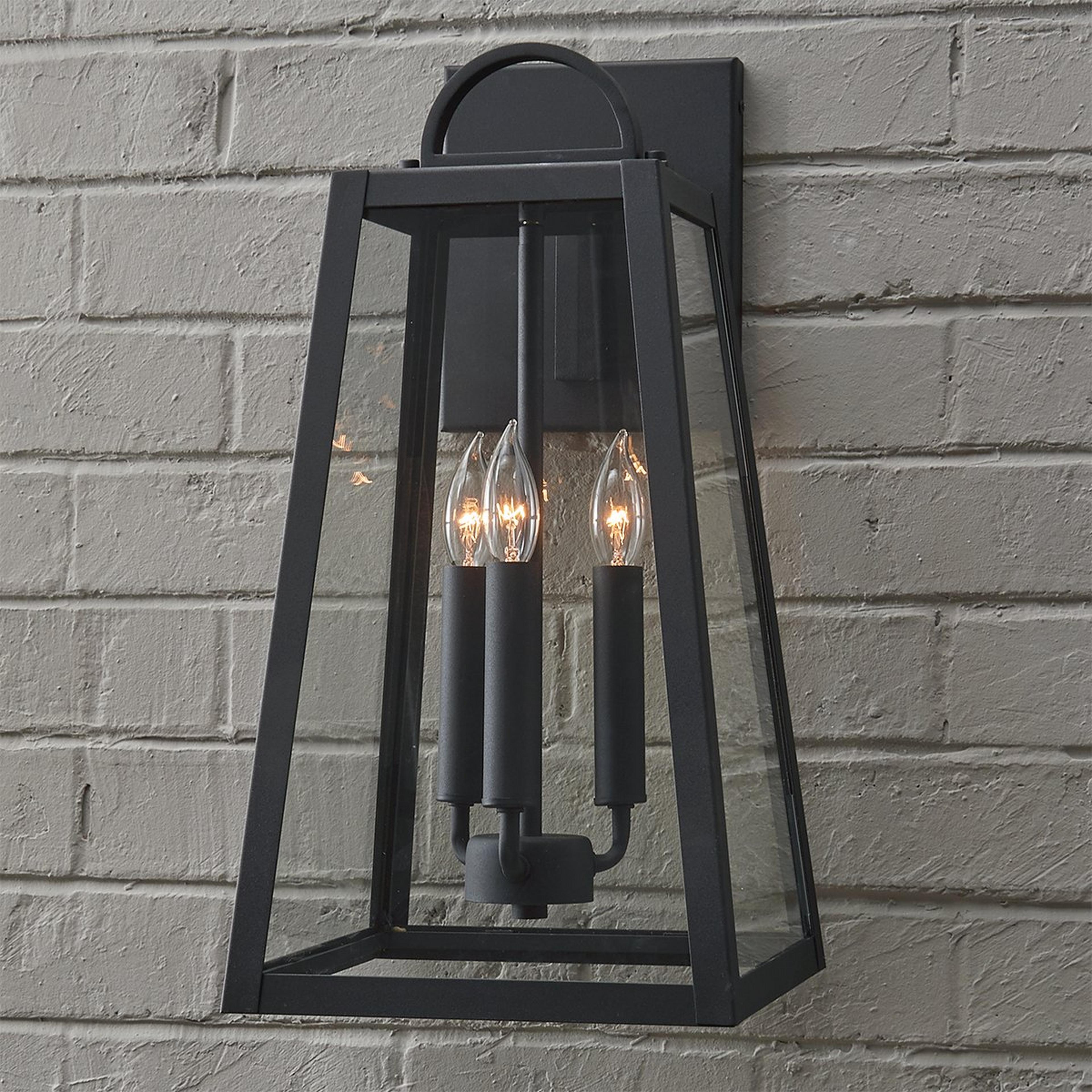 A Classic Ilona Outdoor Sconce - Medium with Black / Clear Glass color