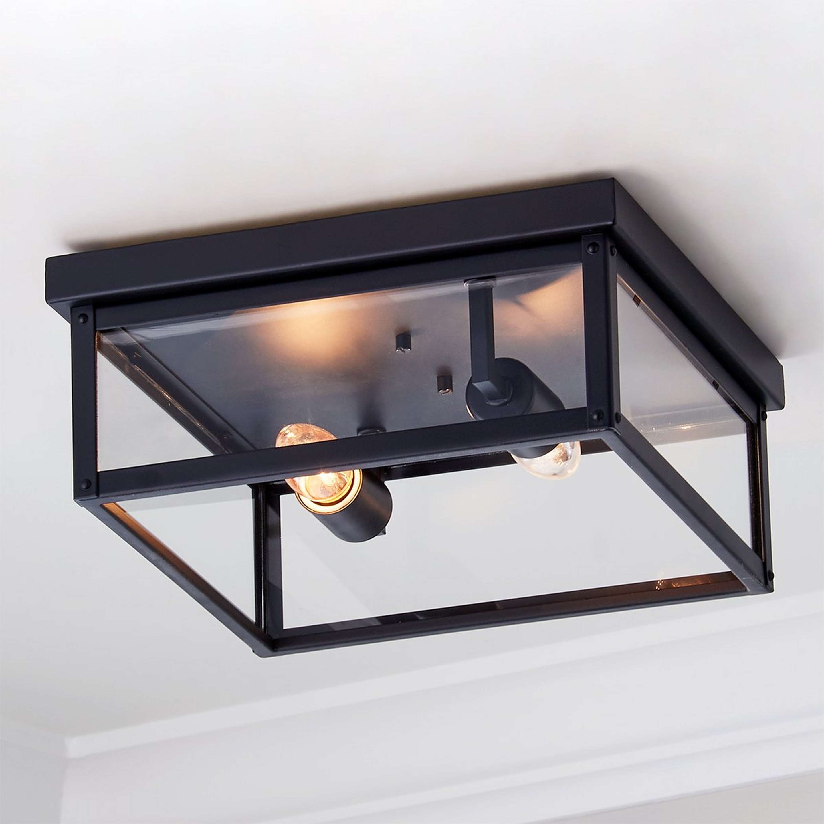 A Clear Glass Square Outdoor Ceiling Light with Black / Clear Glass color