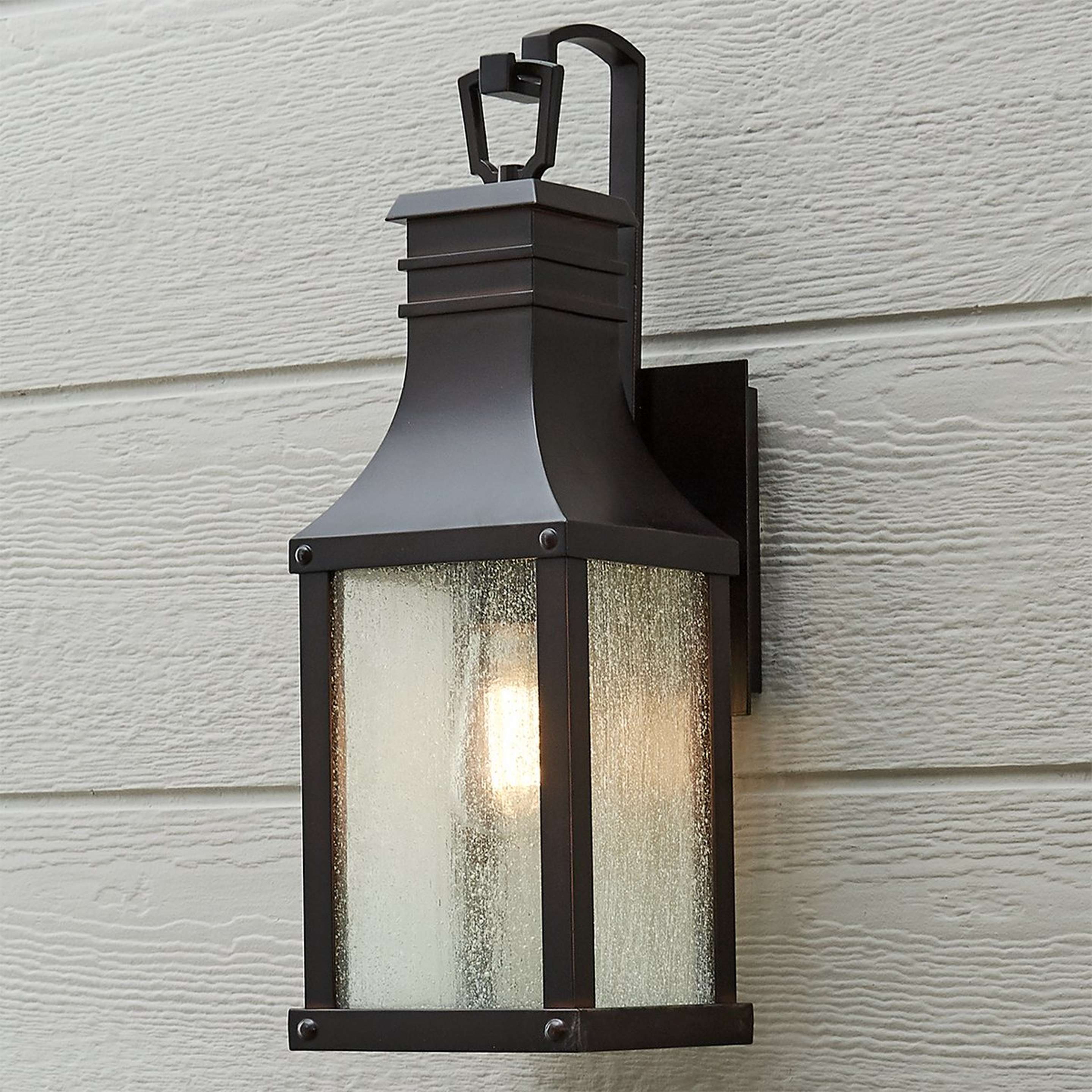 A Canterbury Outdoor Sconce - Small with Darkened Copper / Seeded Glass color