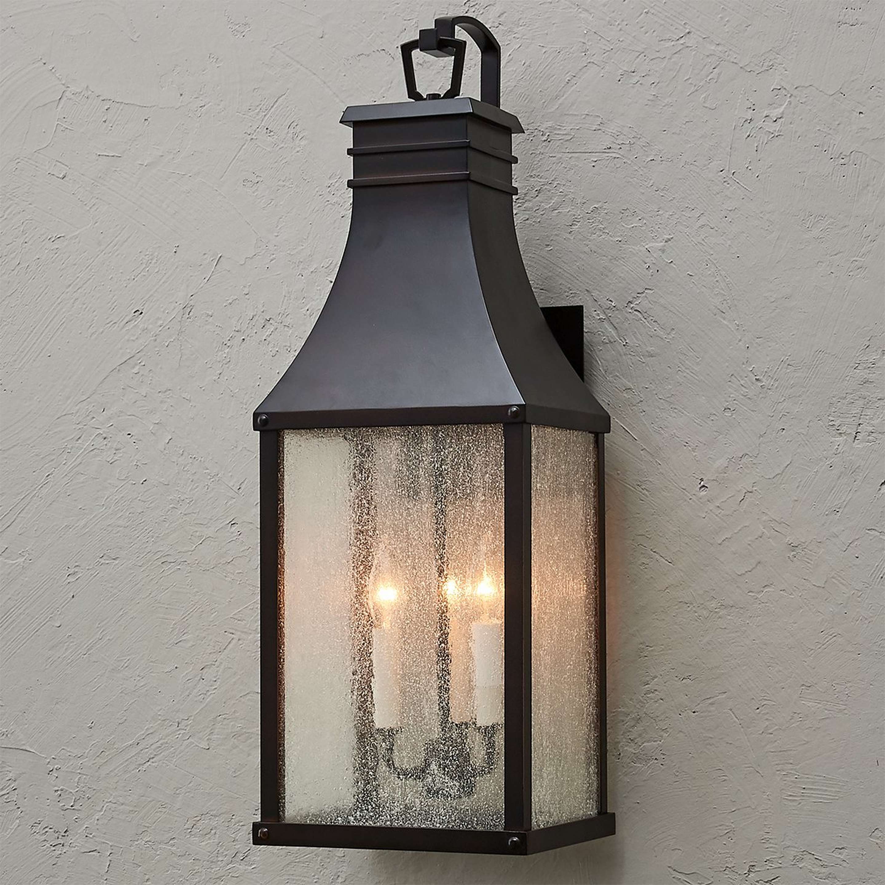 A Canterbury Outdoor Sconce - Large with Darkened Copper / Seeded Glass color