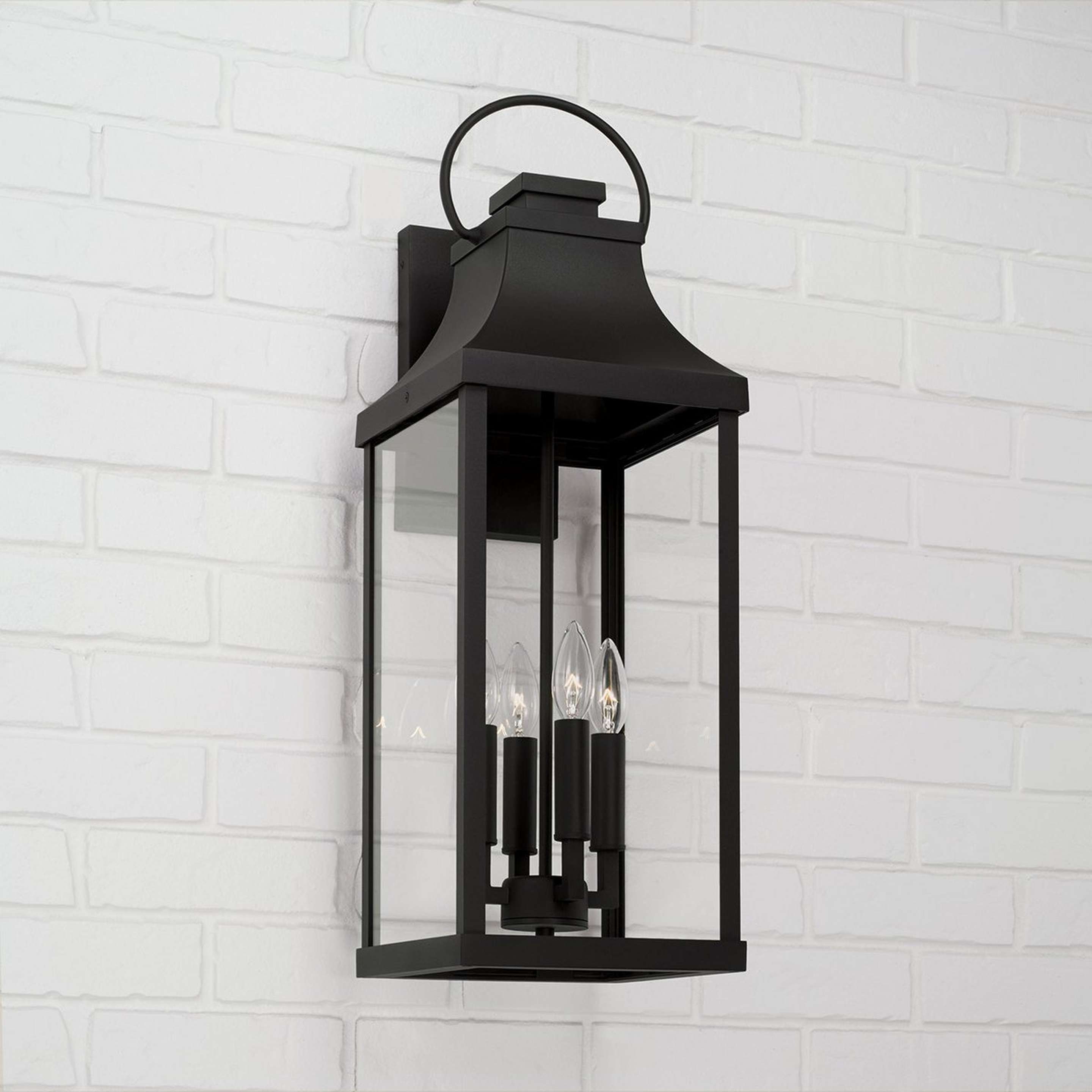 A Aire Libre Outdoor Sconce - 4 Light with Black / Clear Glass color