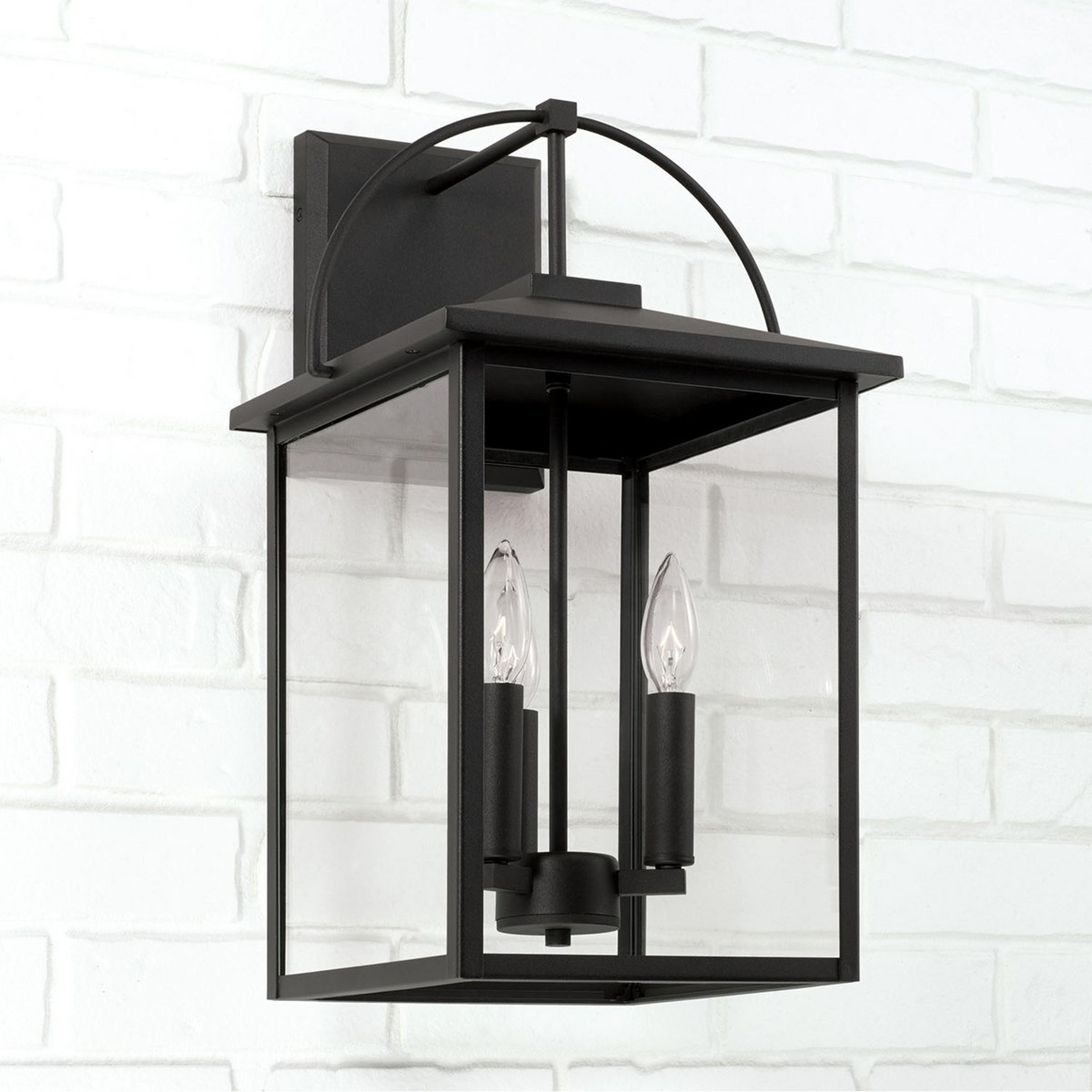 A Aranav Outdoor Sconce - 3 Light with Black / Clear Glass  color