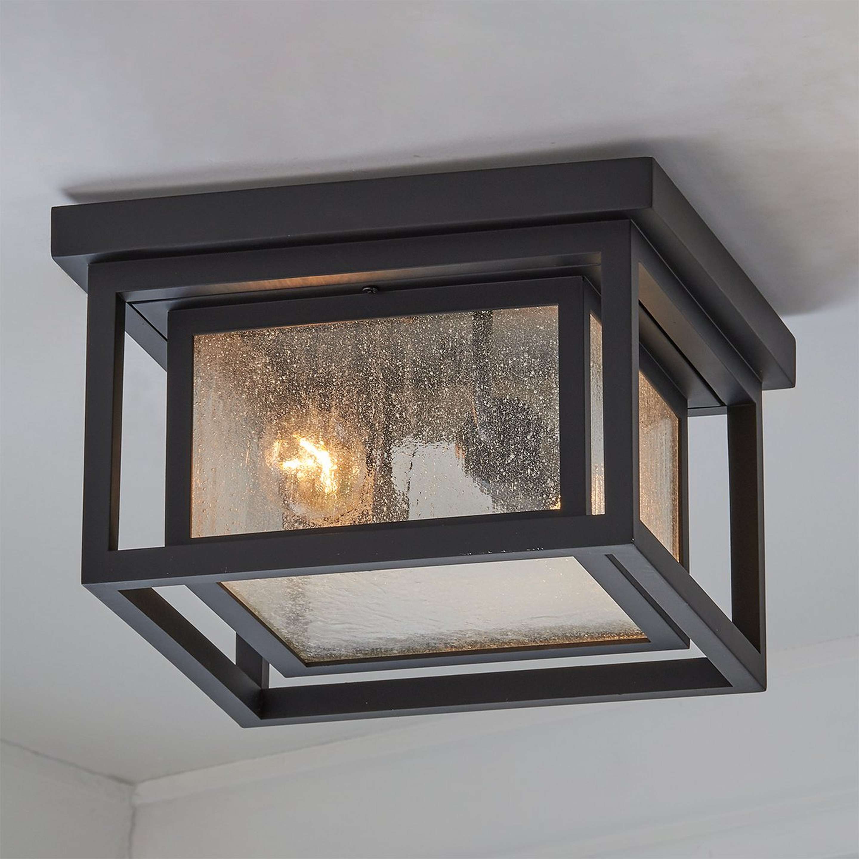 A Framed Squared Ceiling Light with Black / Seeded Glass color
