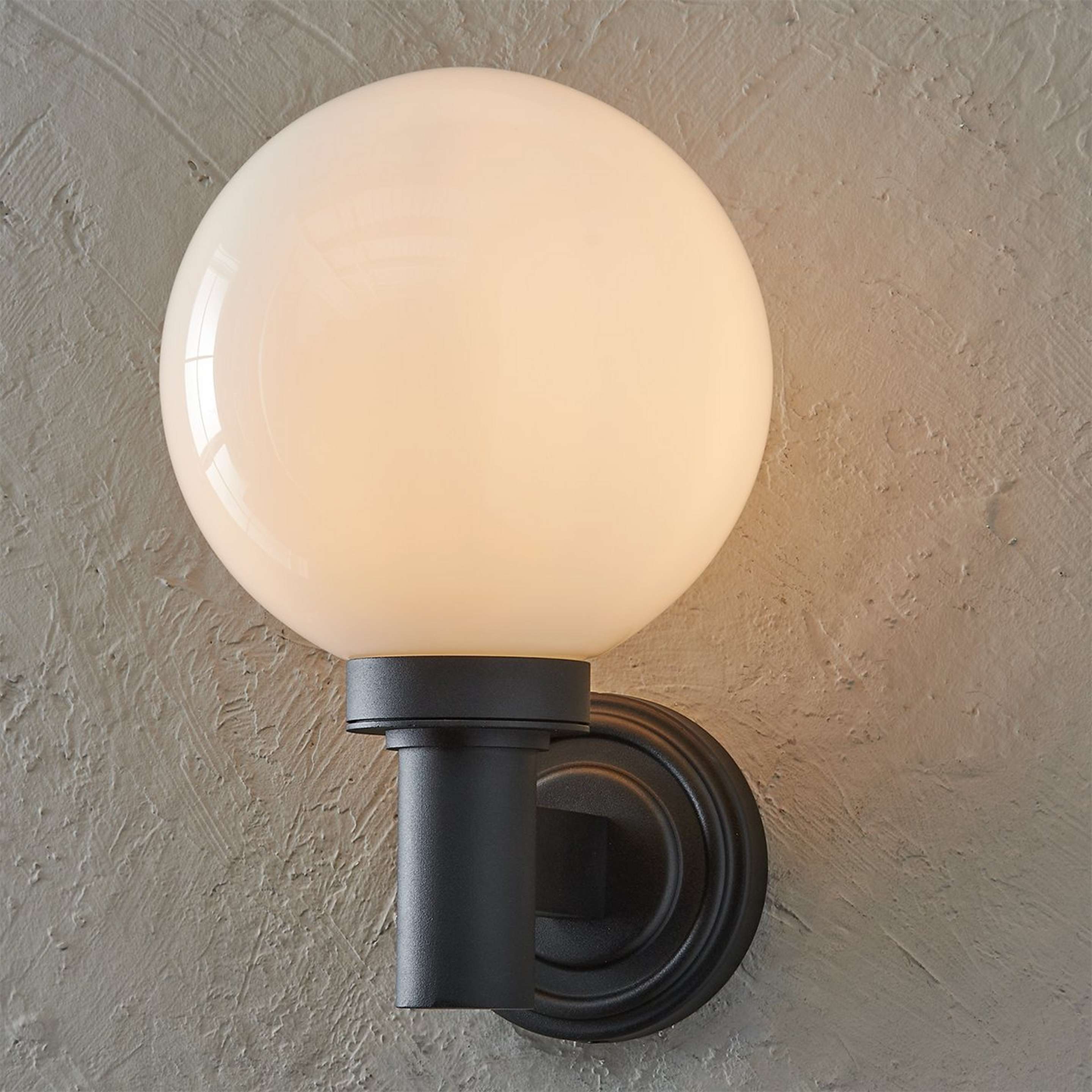 A Norwich Opal Glass Outdoor Sconce with Matte Black / Opal Glass color