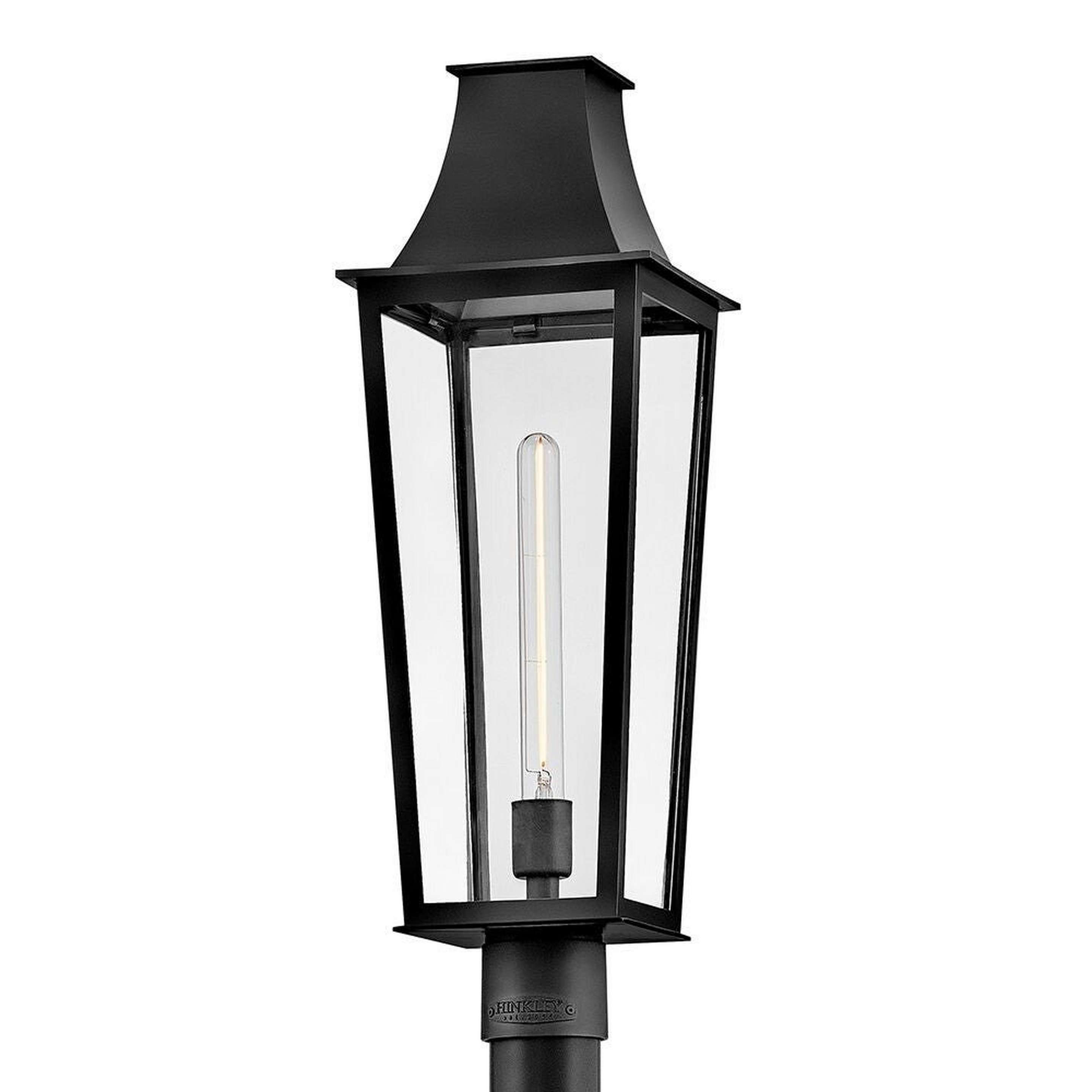 A Sarasota Outdoor Post Light with Black / Clear Glass color