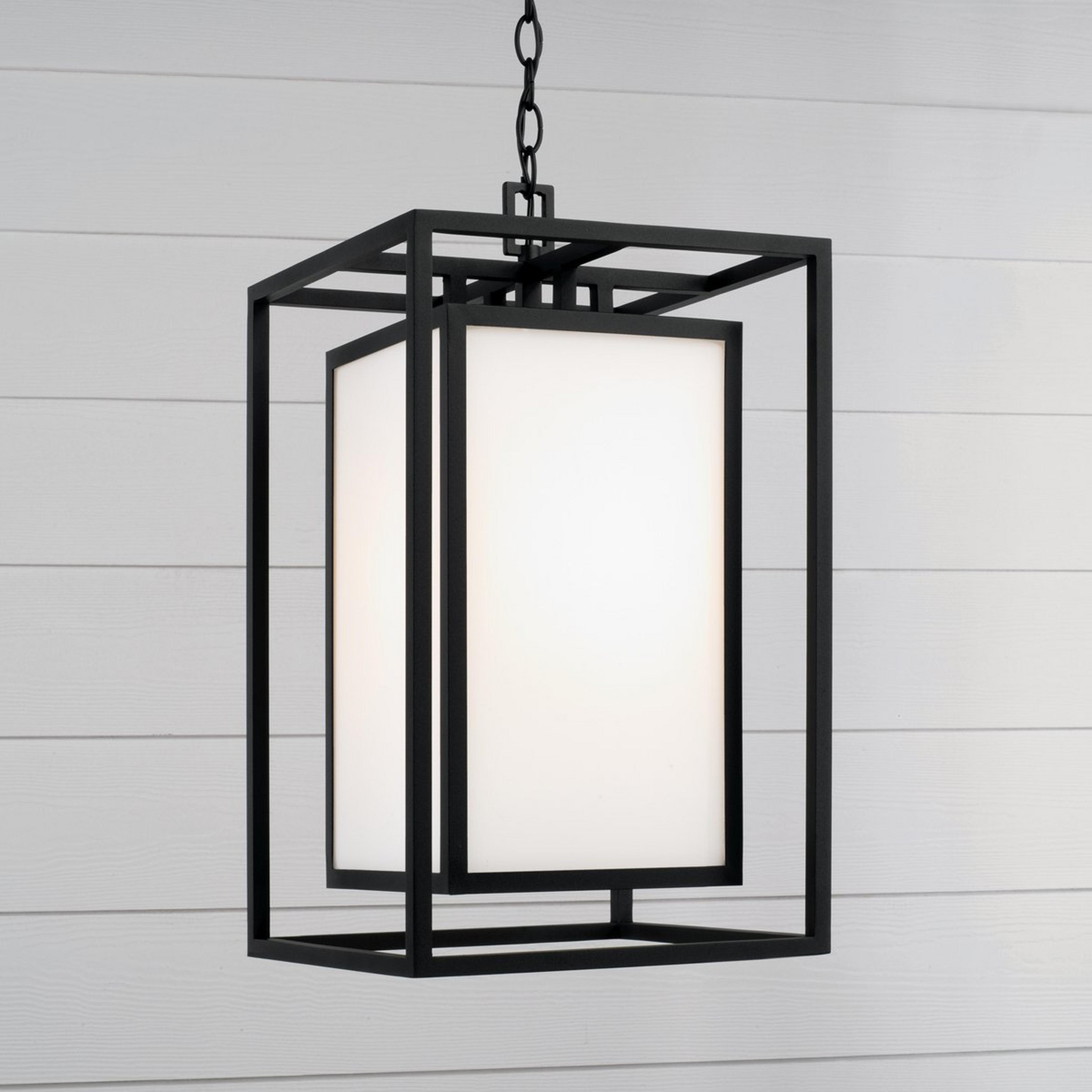 A Hollins Outdoor Lantern with Black / White Glass color