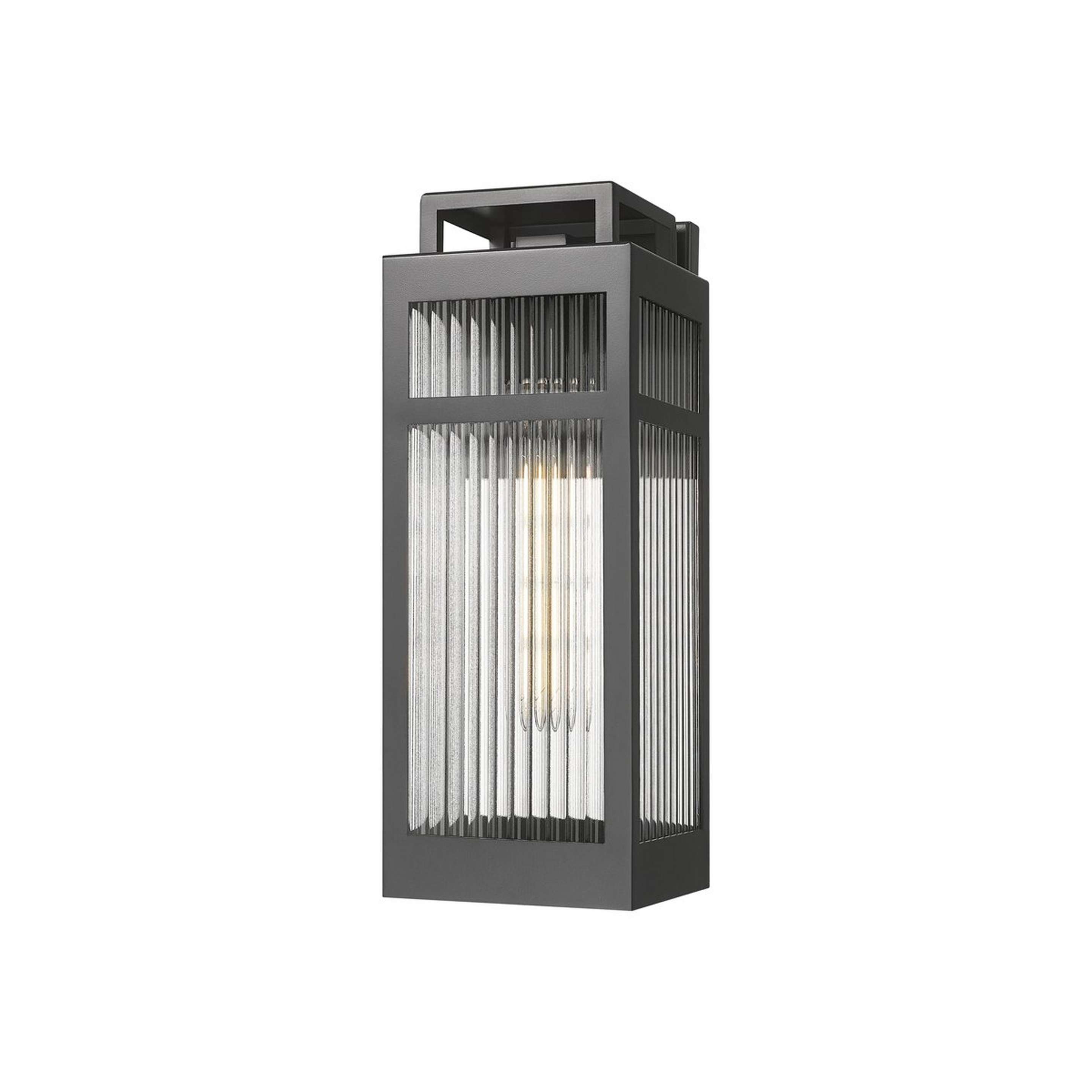 A Basiano Outdoor Sconce with Black / Fluted Clear Glass color