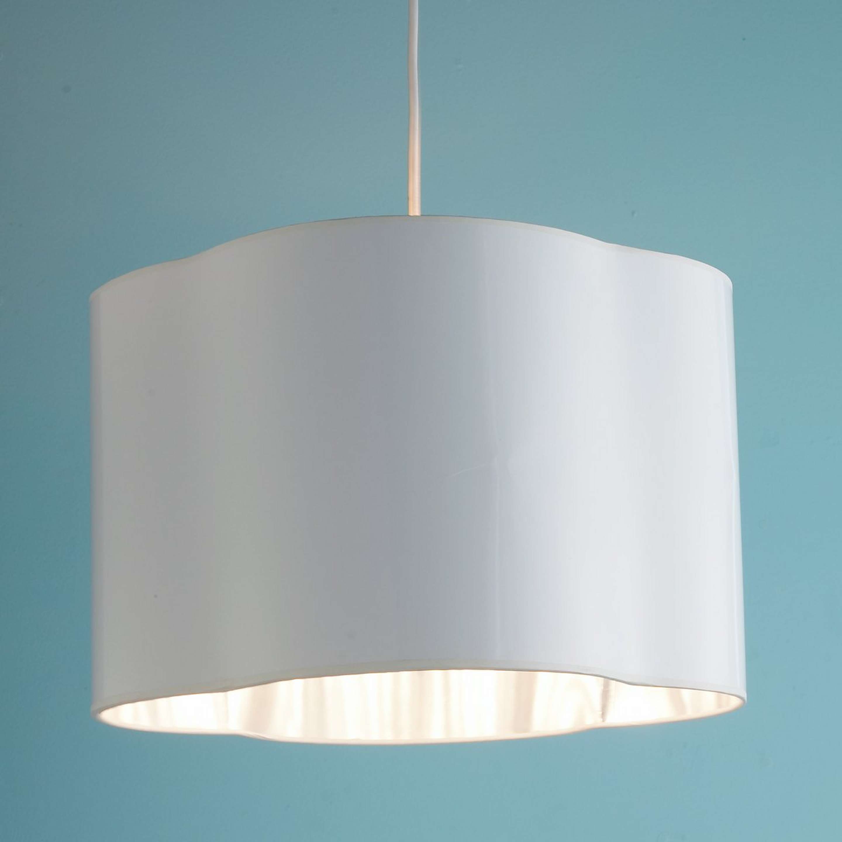A 16 inch Quatrefoil Shade Pendant with White / Silver Lining color