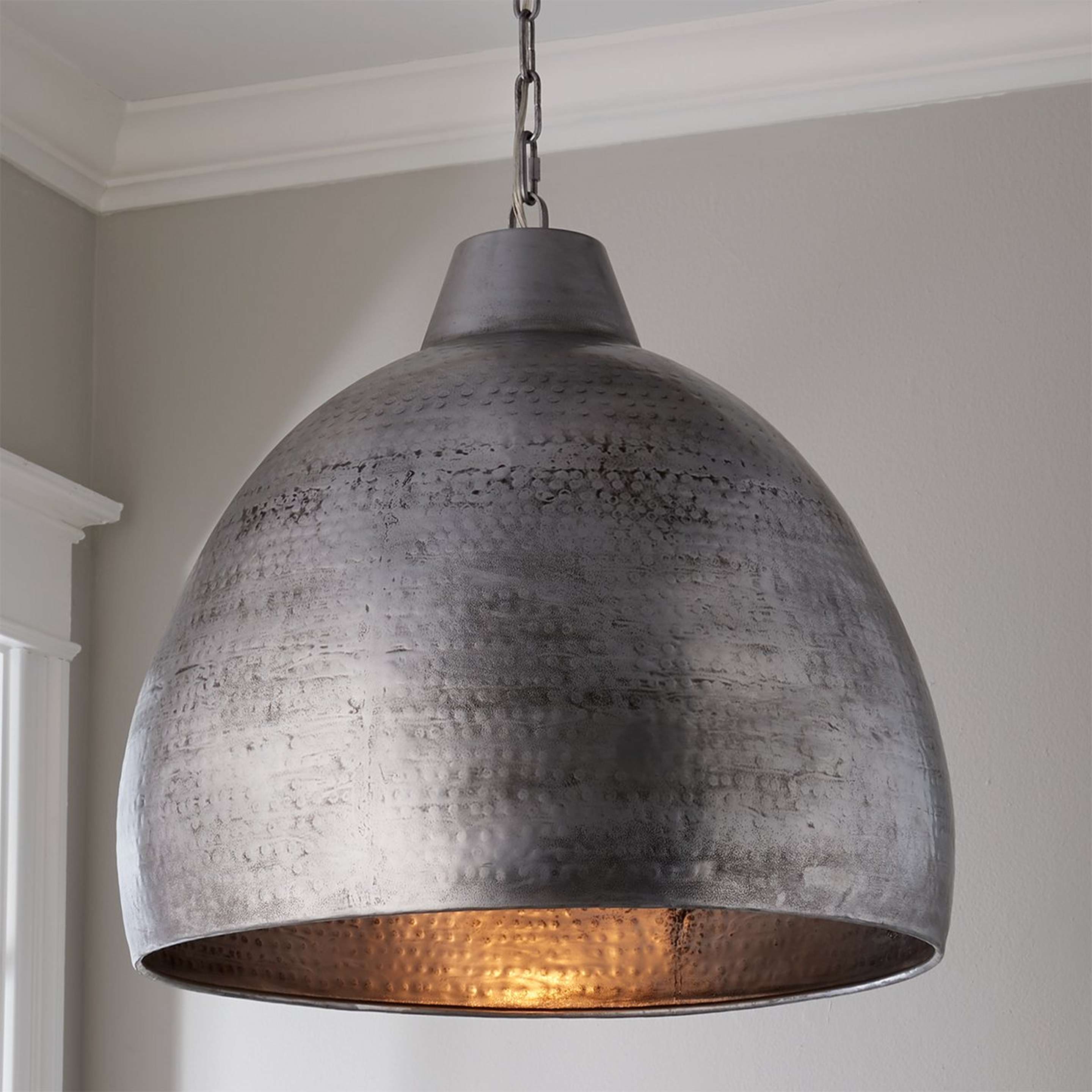 A Hammered Steel Oversized Dome Pendant with Aged Steel color