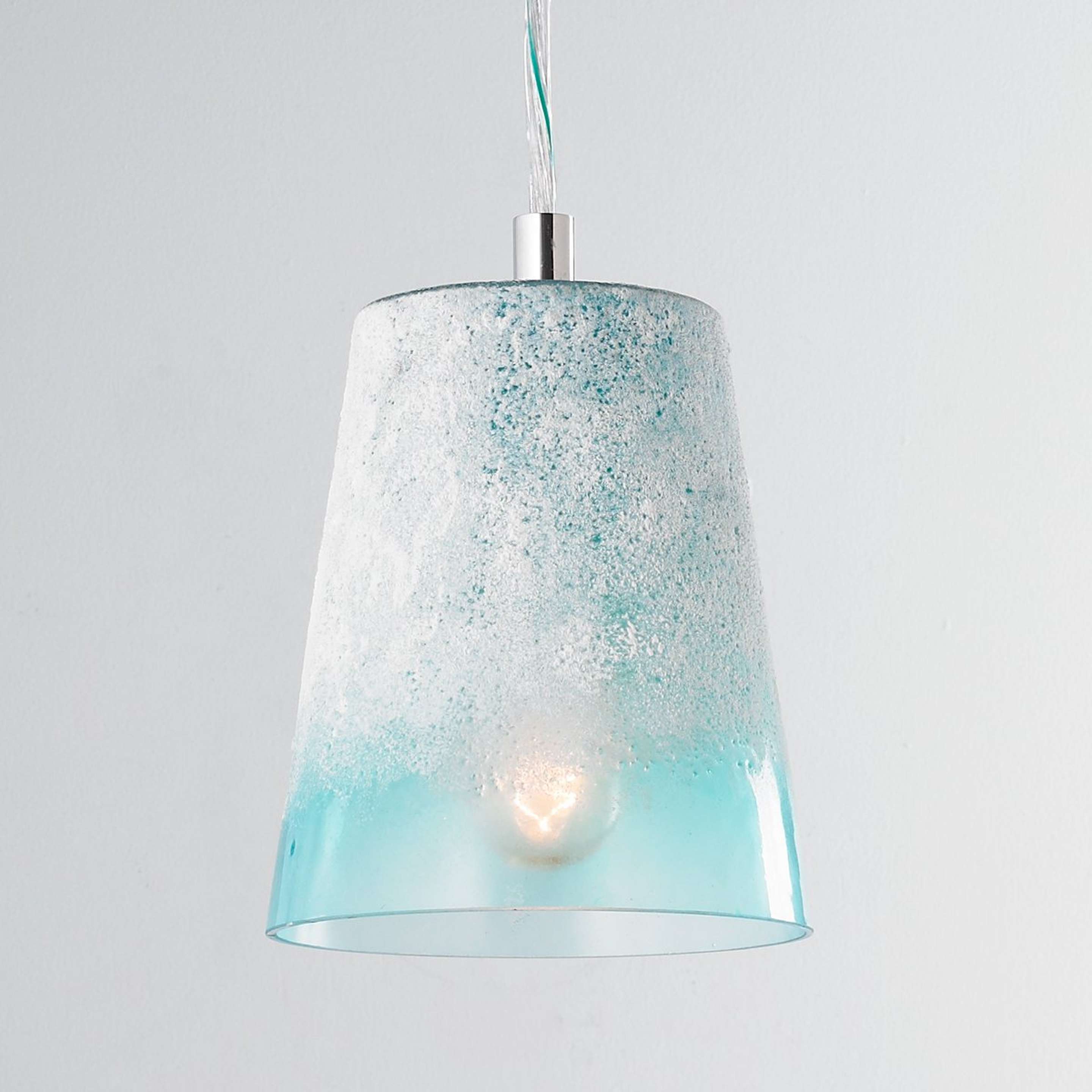 A Sand Frost Glass Pendant Light with Aqua color