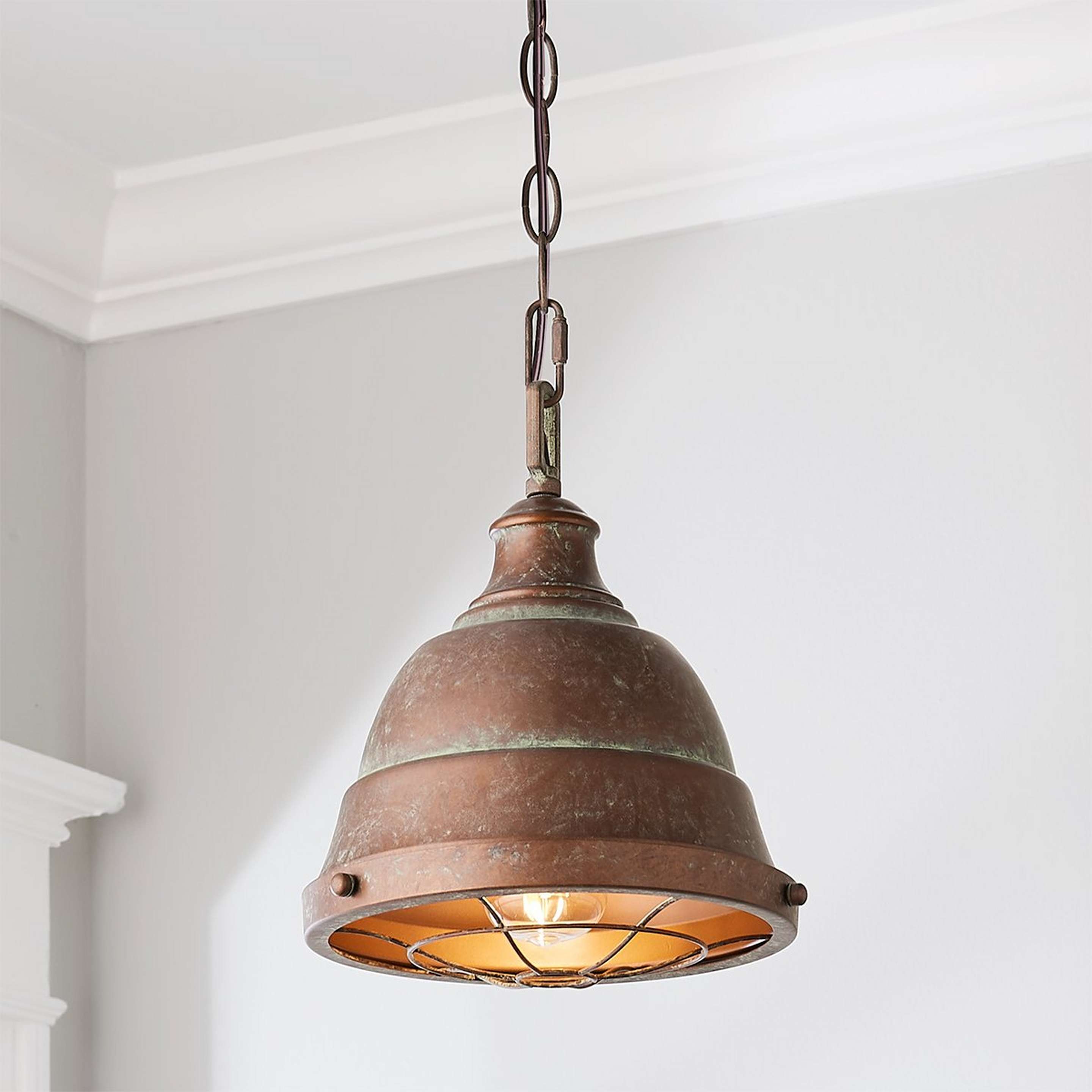 A Weathered Industrial Caged Pendant - 1 Light with Copper Patina / Copper color