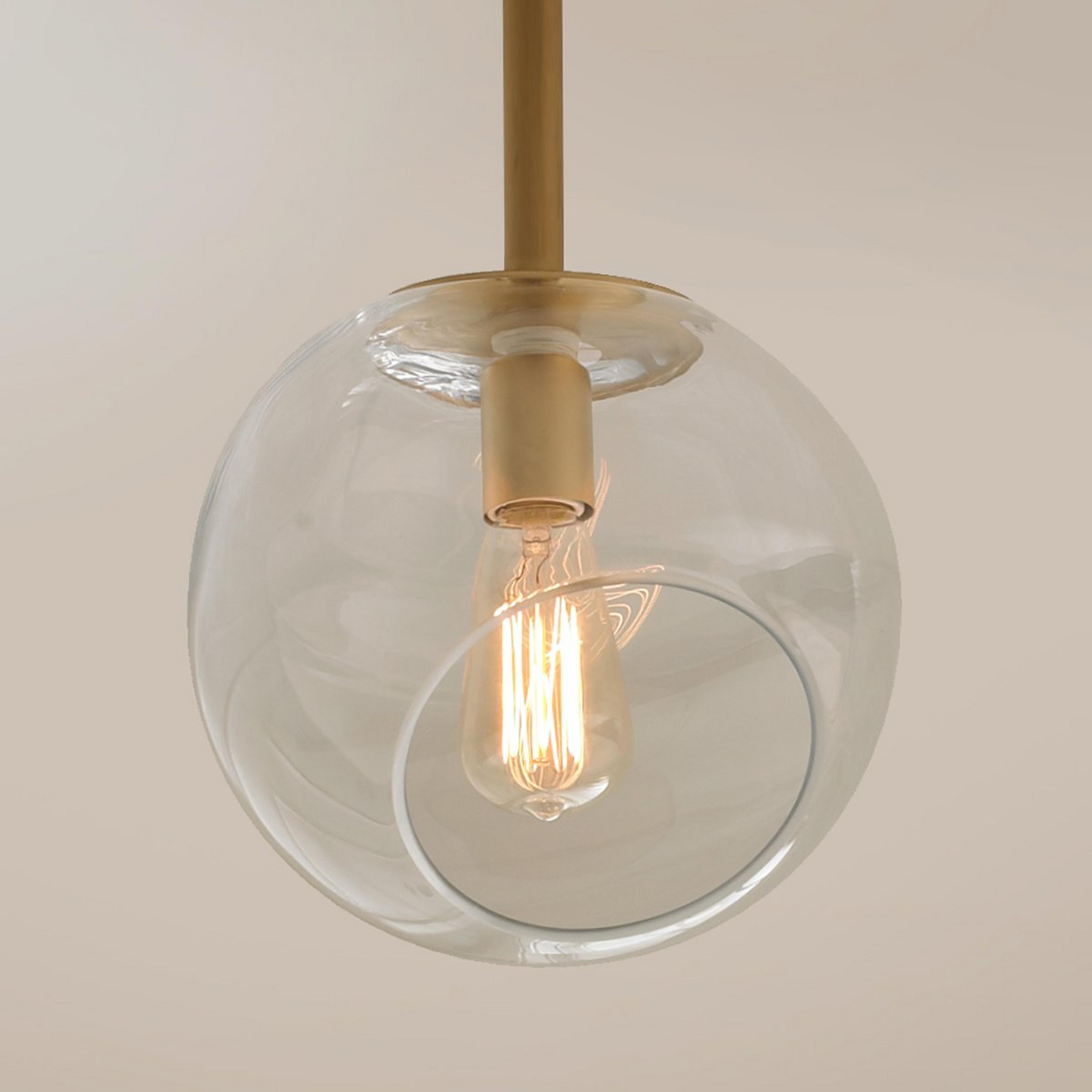 A Young House Love Wonky Glass Pendant with Gold color