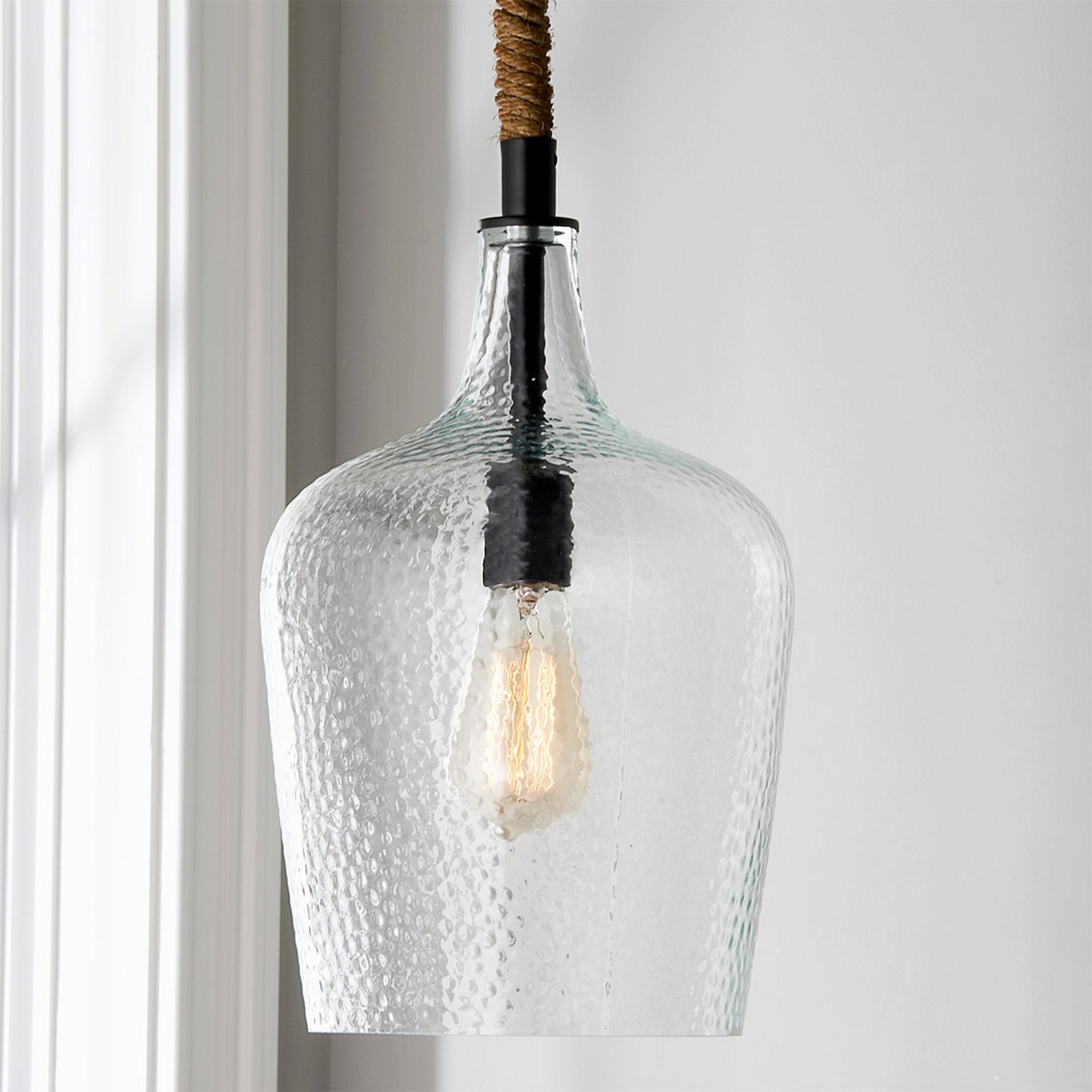 A Rehoboth Hammered Glass Pendant with undefined color