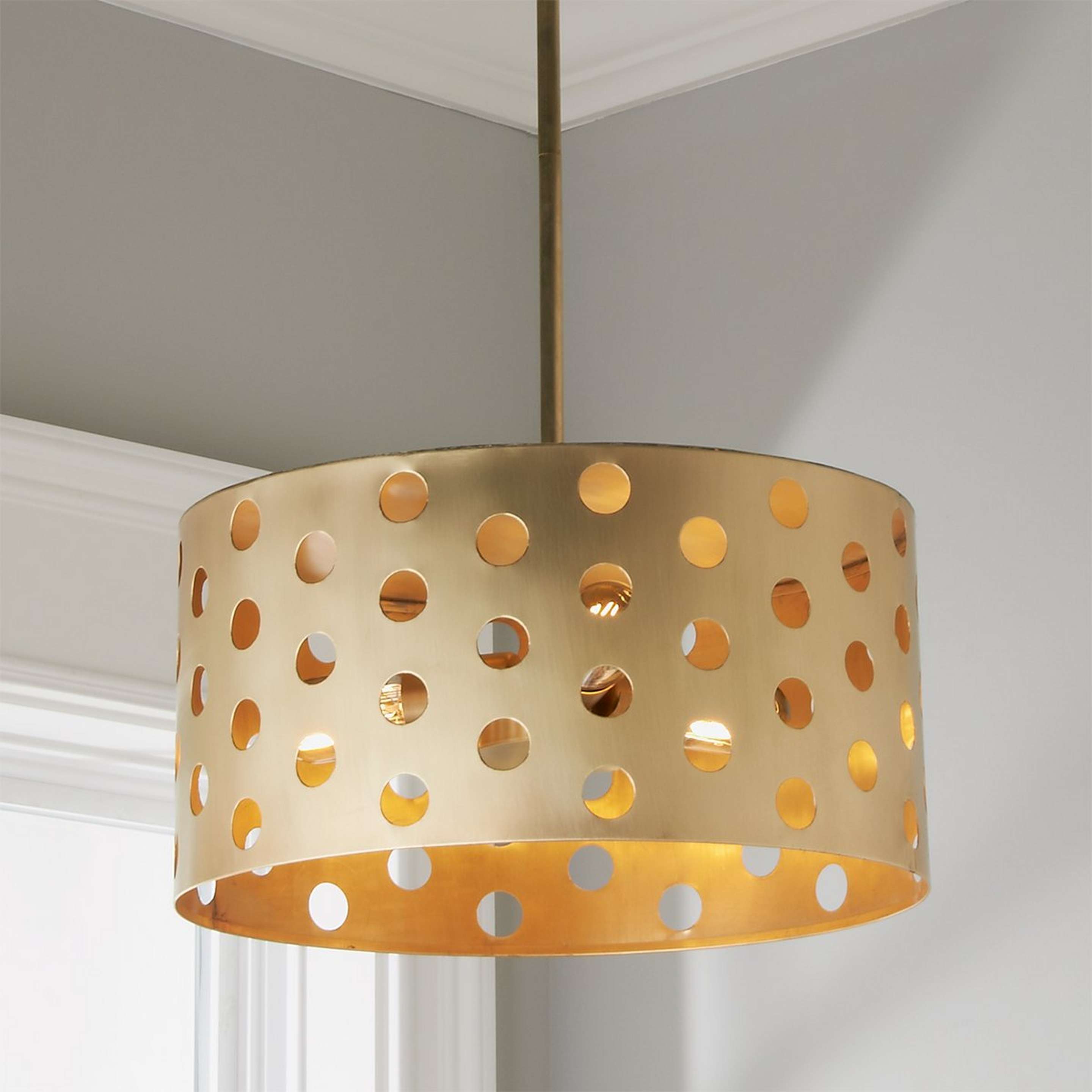 A Colonial Metalcrafts Mod Circles Pendant - 3 Light with Lacquered Brass color