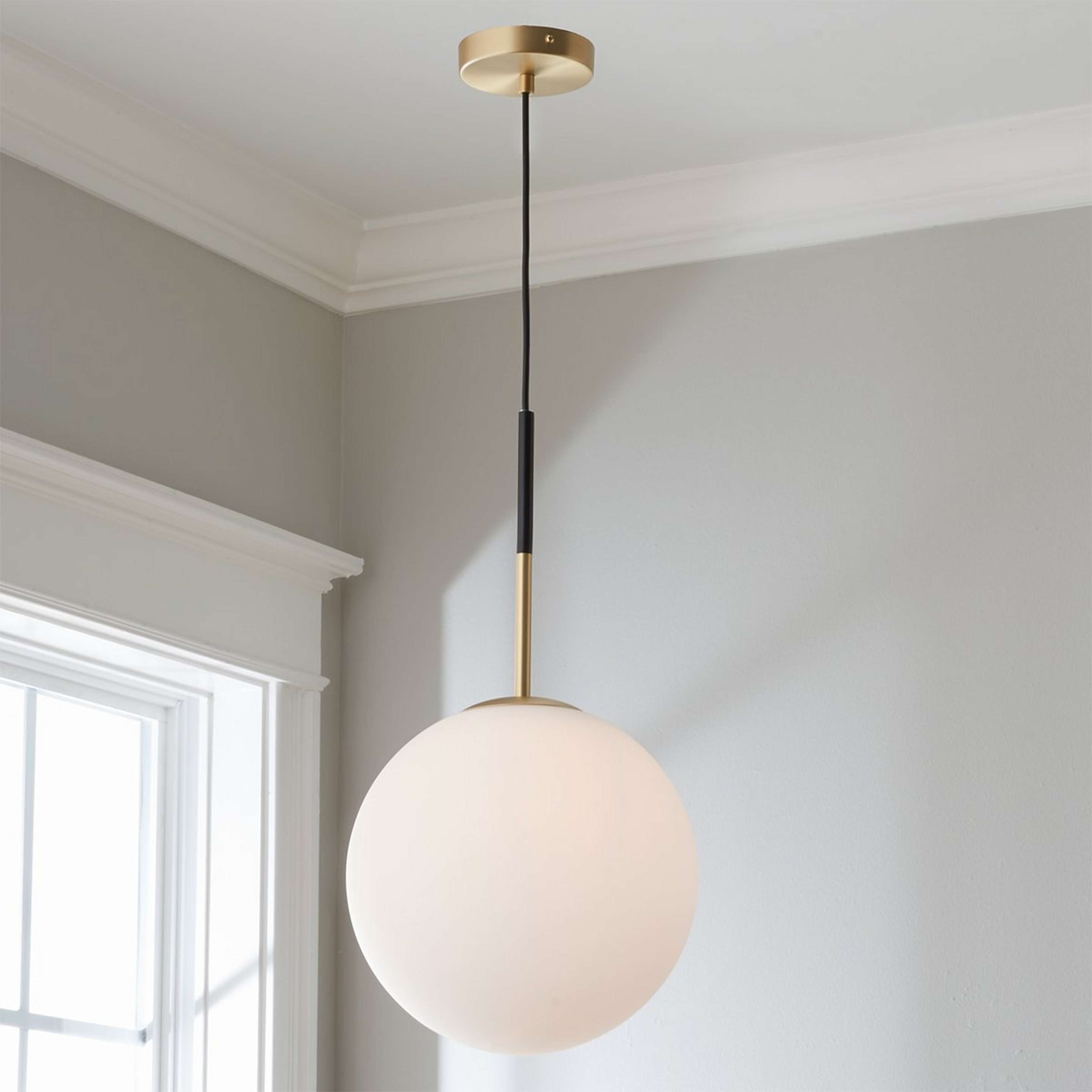A Scandinavian Large Mod Globe Pendant with Satin Brass / Black / Opal Glass color