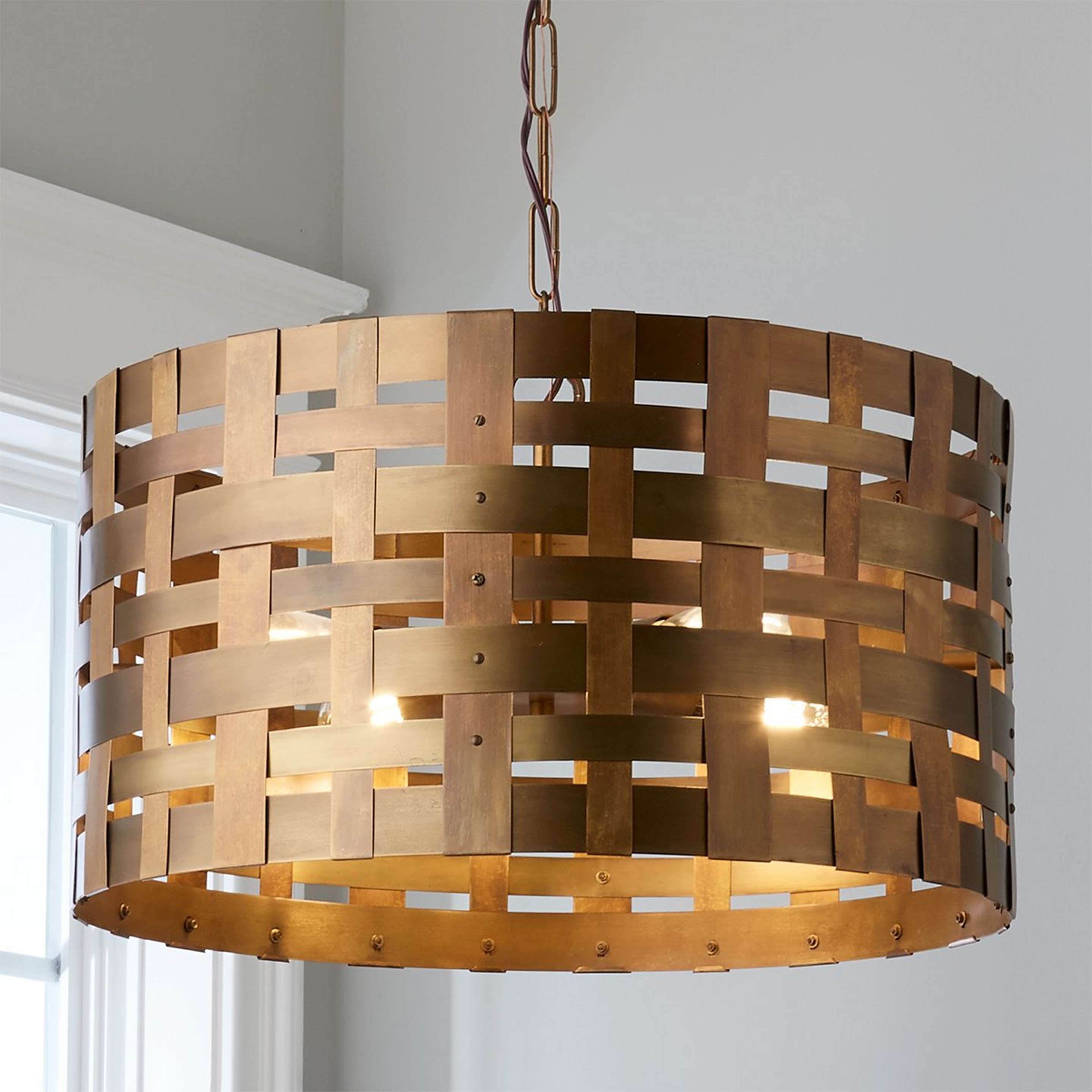 A Metal Basketweave Pendant with Patina Brass color