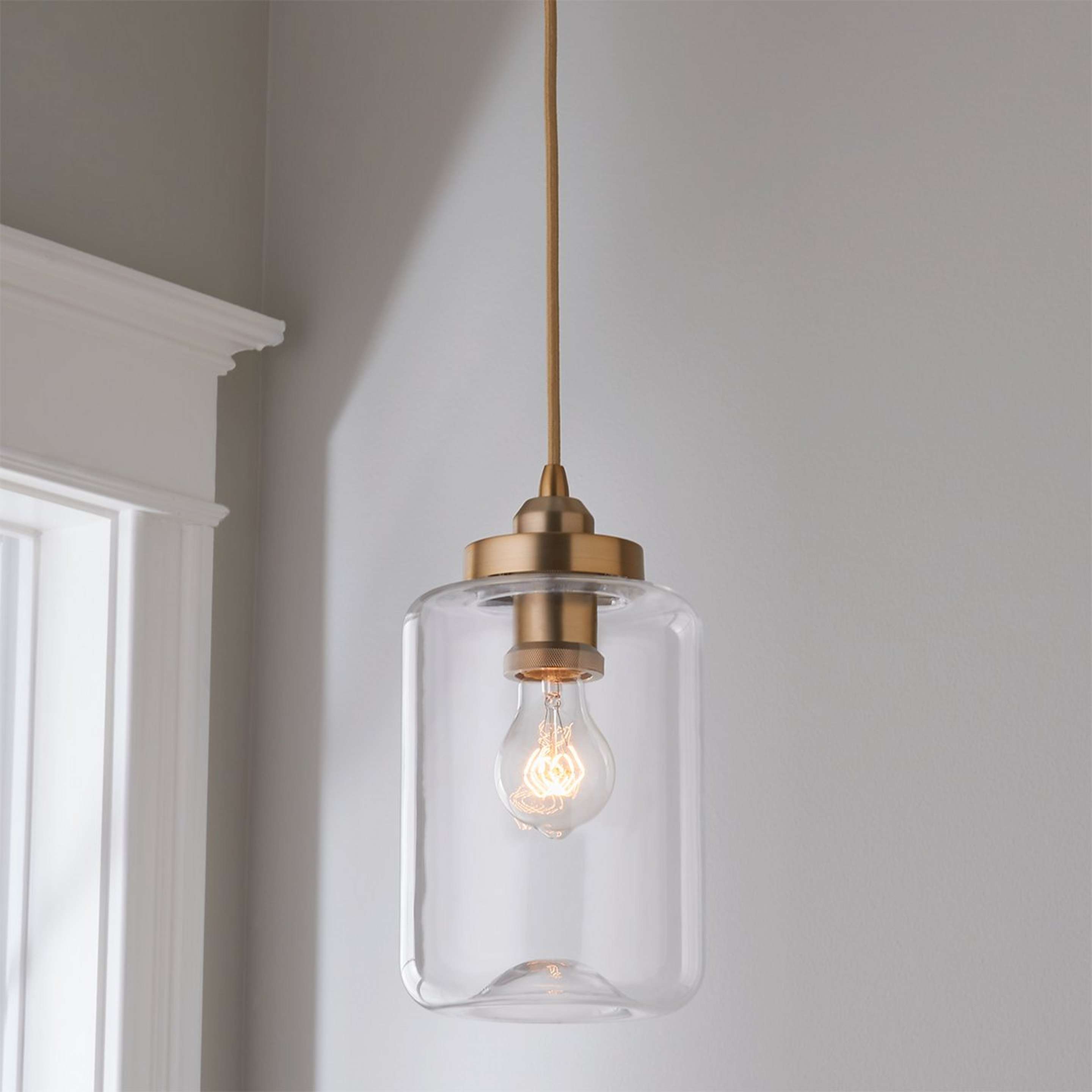 A Houston Cylinder Pendant - Medium with Aged Brass / Clear color