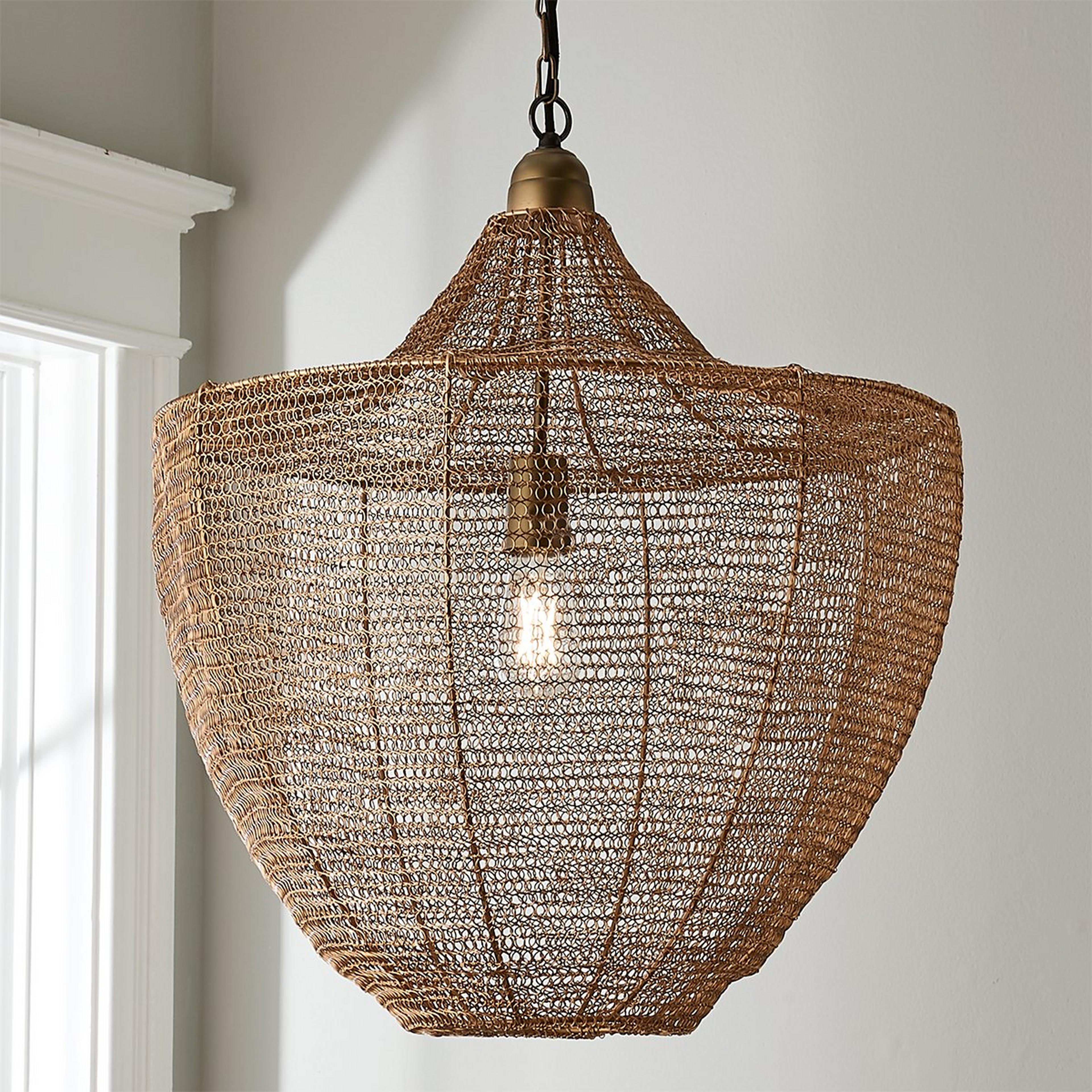 A Boho Woven Wire Pendant with Aged Brass color