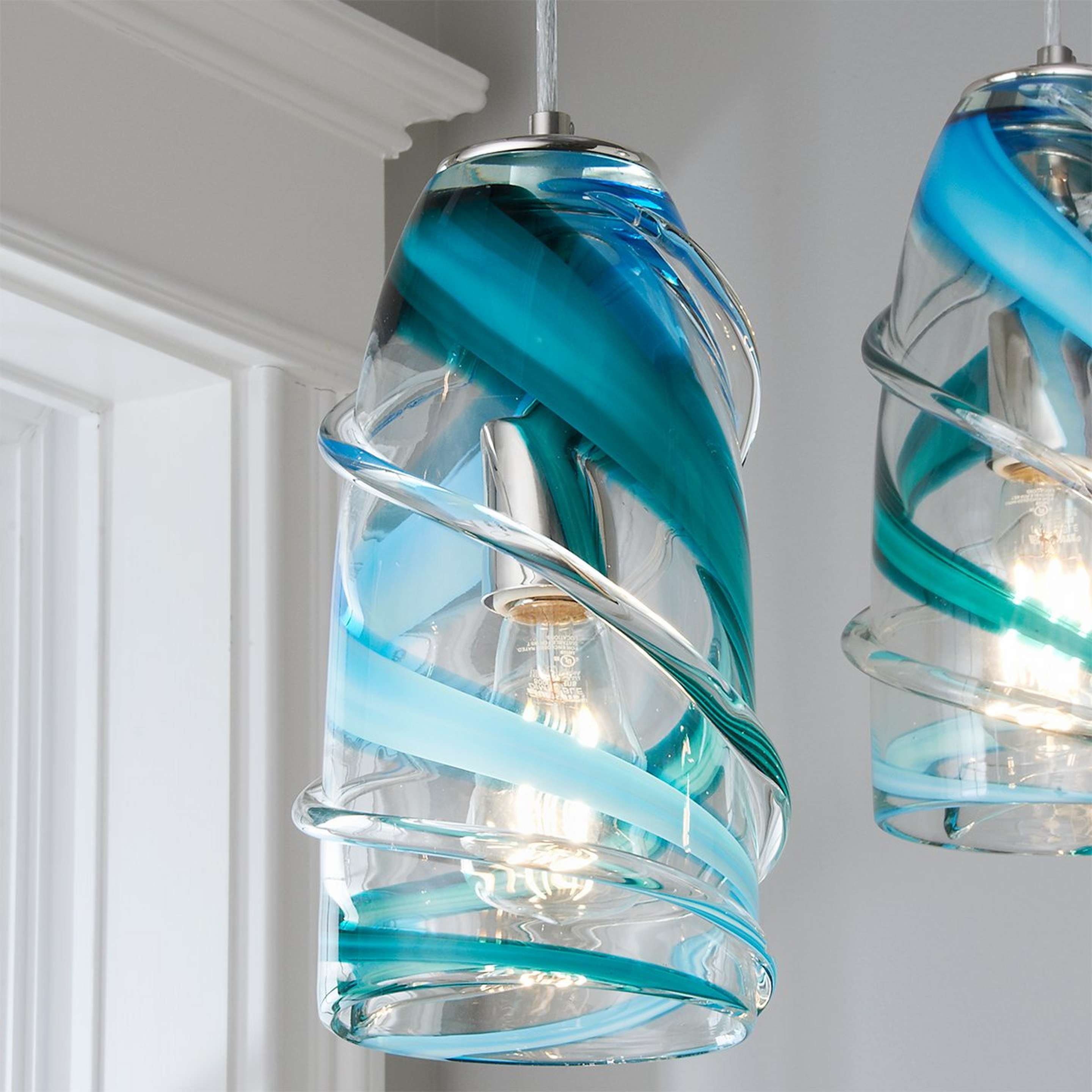 A Calypso Swirl Pendant with Chrome / Blue / Clear color
